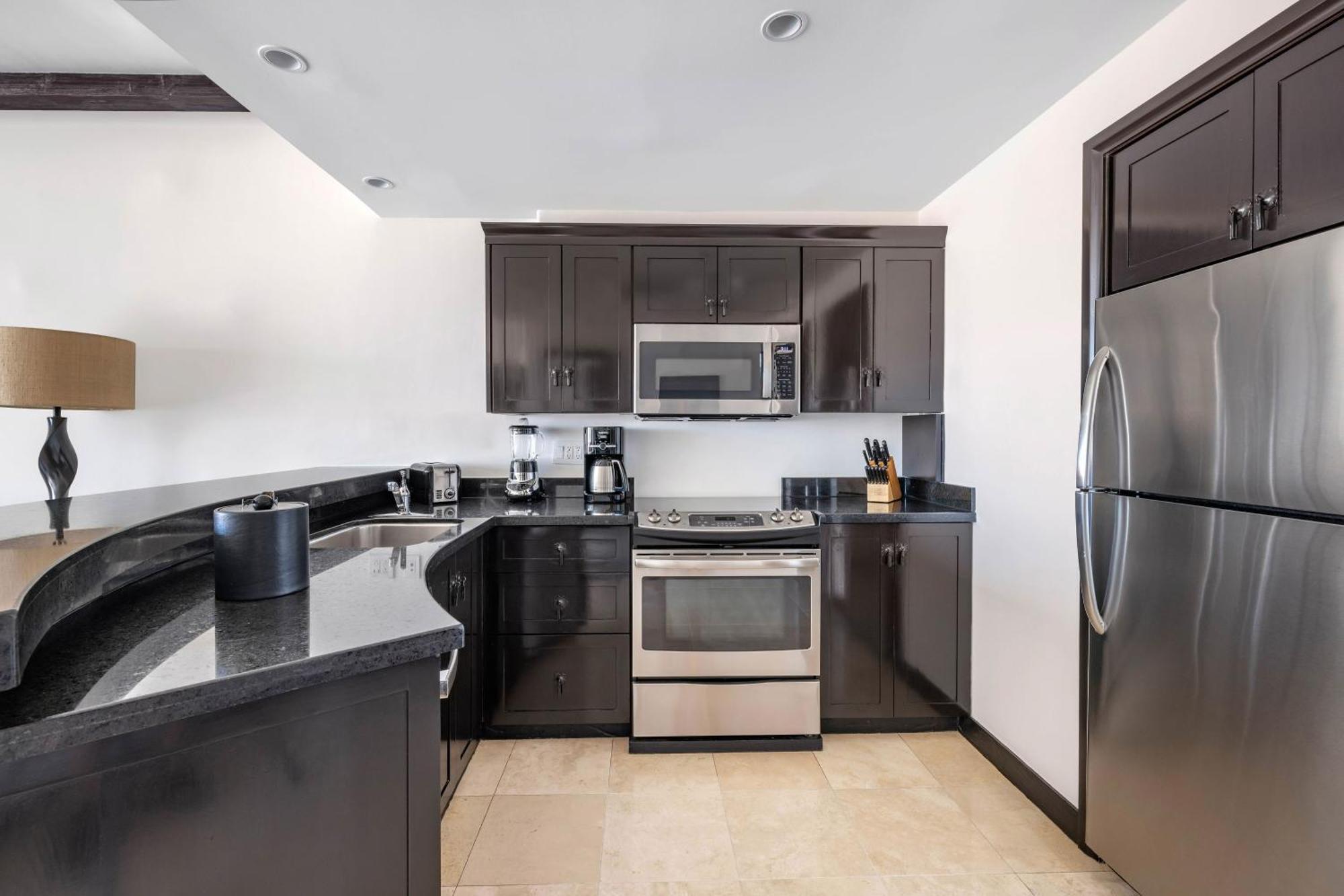 Deluxe Two Bedroom with One King and One Queen Beds - Pool View
