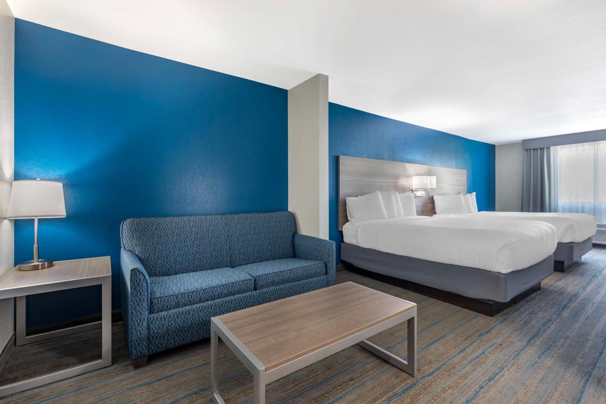 Queen Suite with Two Queen Beds with Sofa Bed
