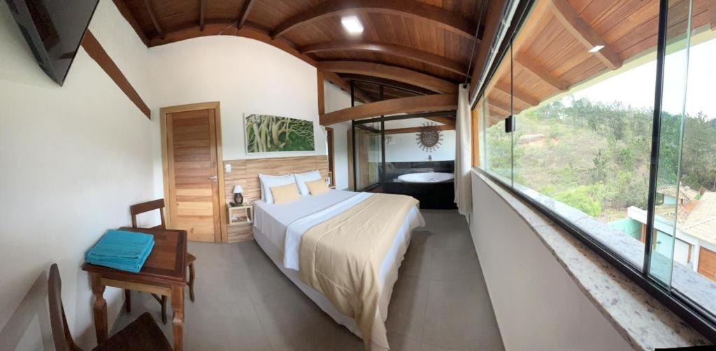 Suíte Deluxe com Banheira de Hidromassagem