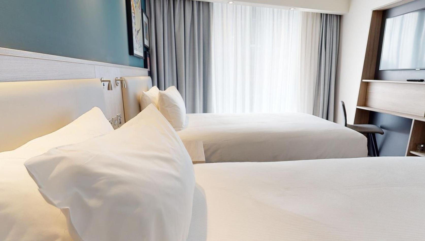 Tweepersoonskamer met 2 Aparte Bedden