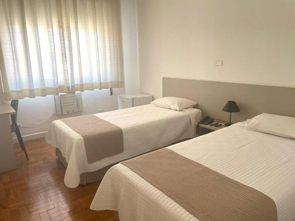 Quarto Quádruplo com Banheiro Compartilhado