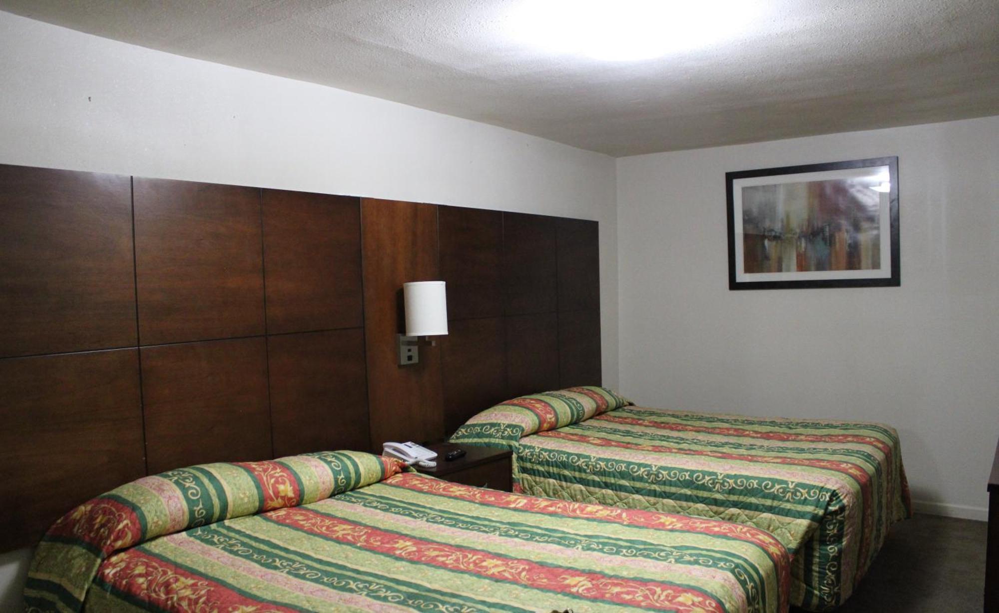 Chambre avec 2 Grands Lits Queen-Size