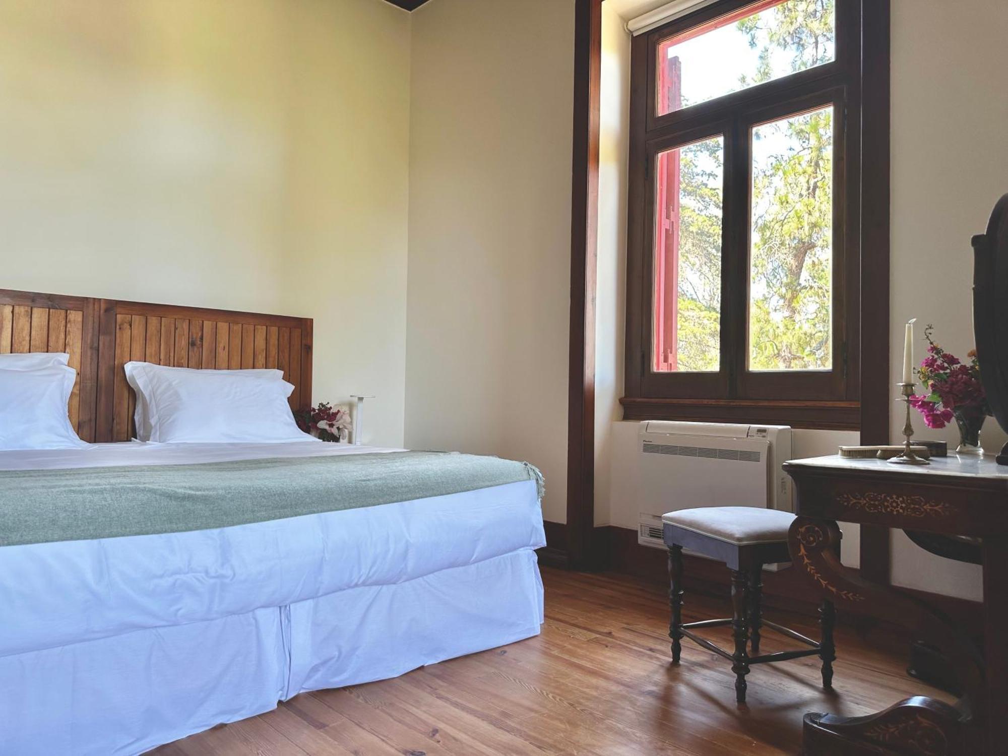 Superior Suite mit Queensize-Bett und Gartenblick