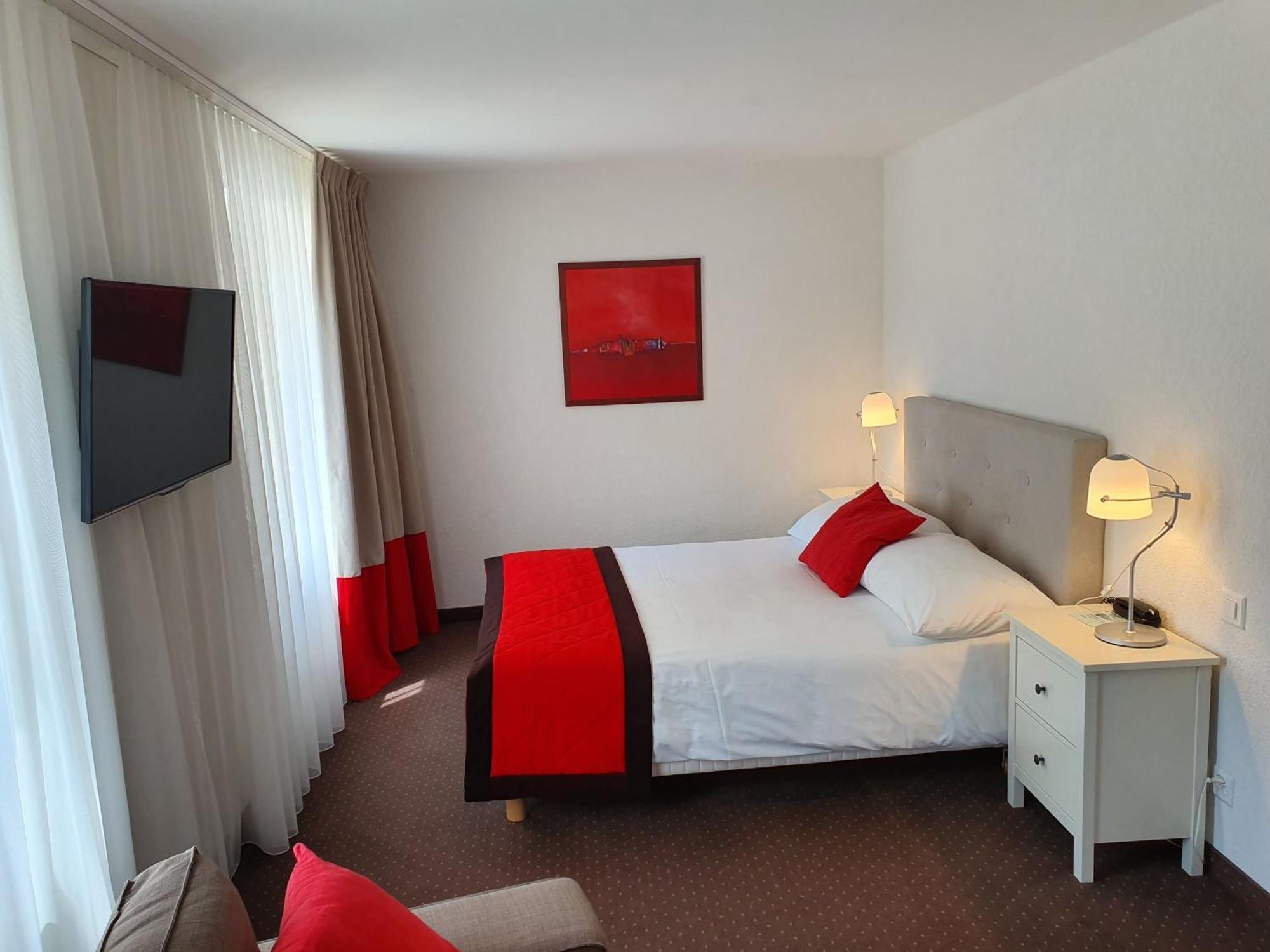 Hébergement Lit Queen-Size Confort Supérieur Côté Ville
