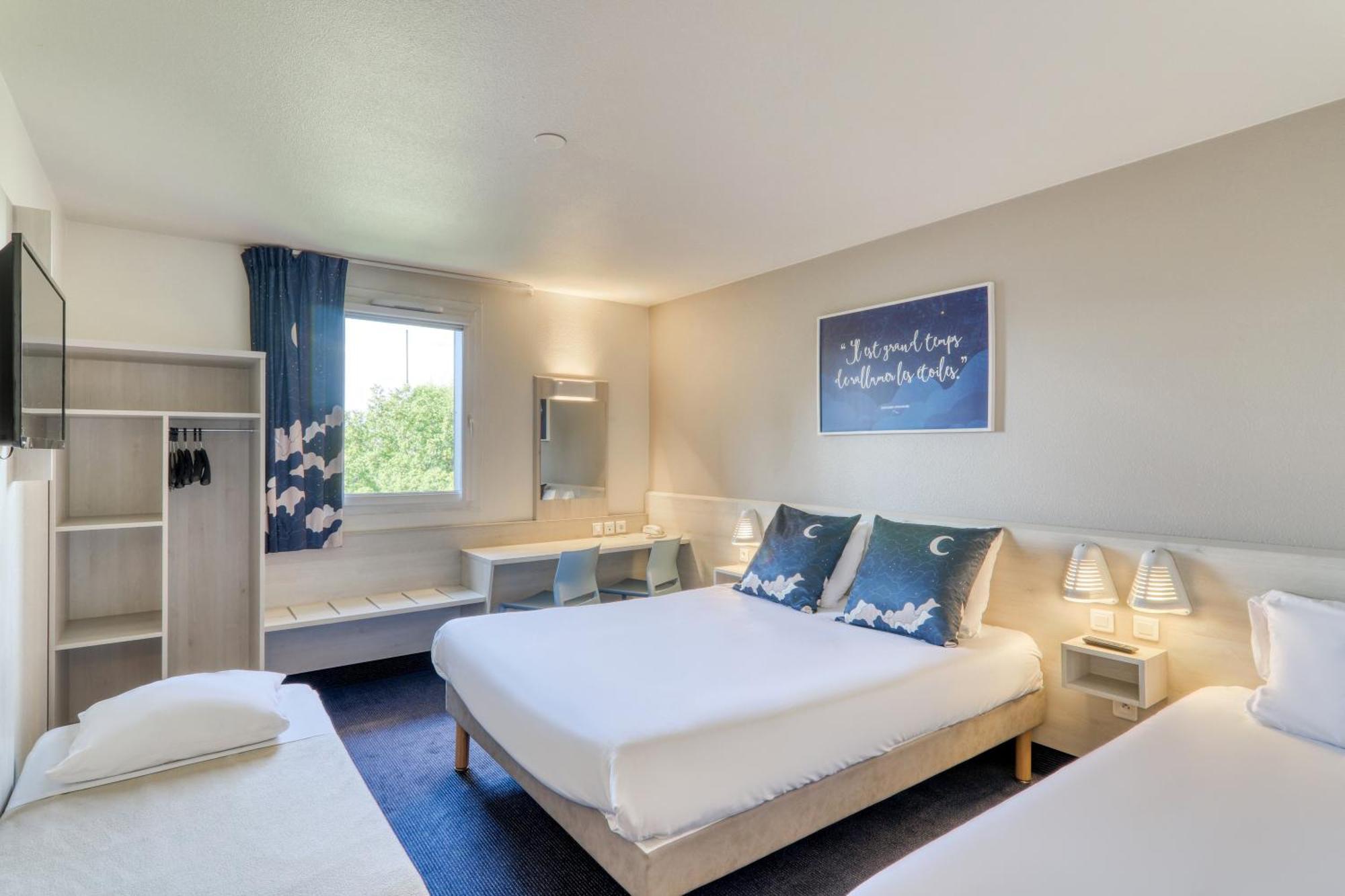 Chambre Quadruple (1 Lit Double, 1 Lit Simple, 1 Lit Enfant (70/160 cm))