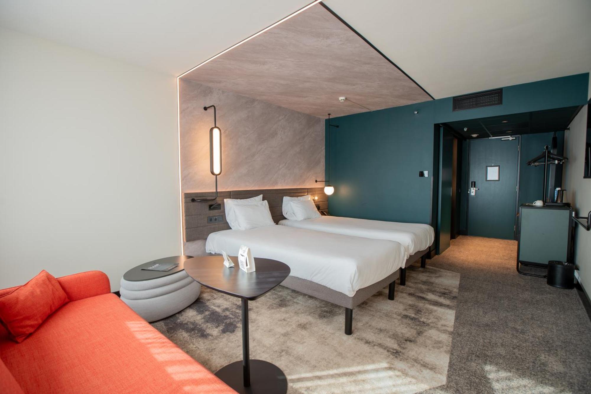 Superior Tweepersoonskamer met 2 Aparte Bedden en een Slaapbank