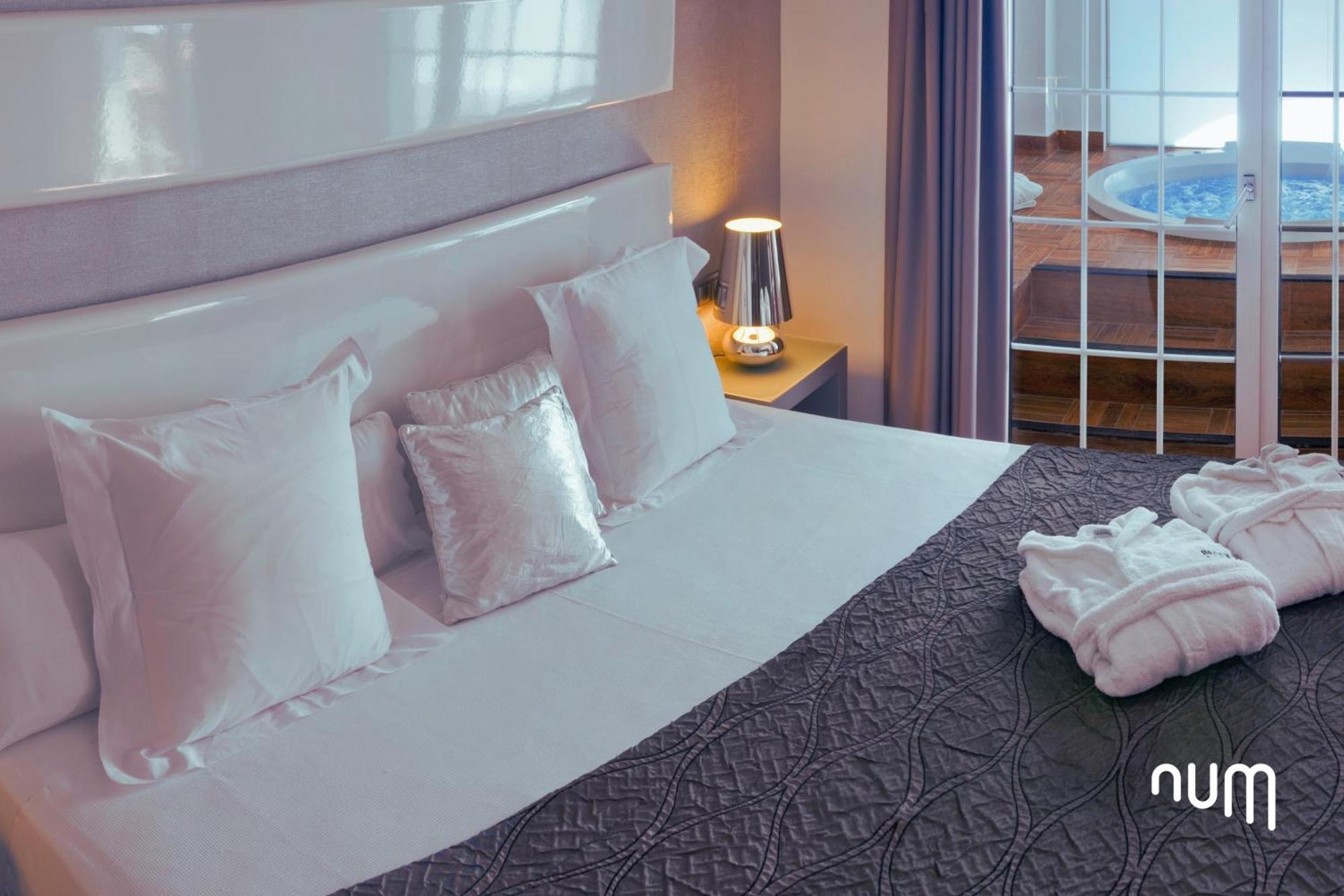 Suite con bañera de hidromasaje - Cama extragrande