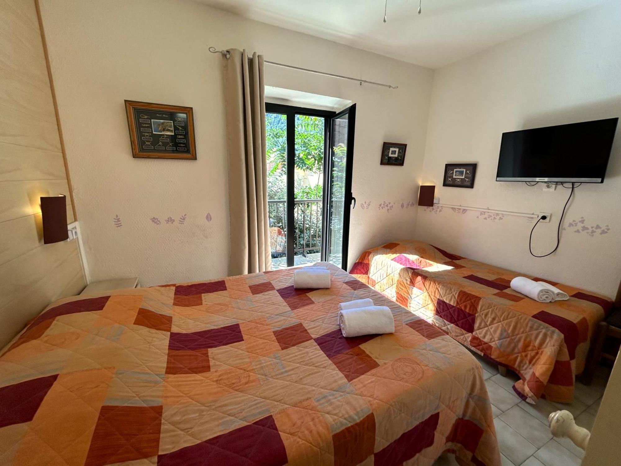 Chambre Triple avec Balcon