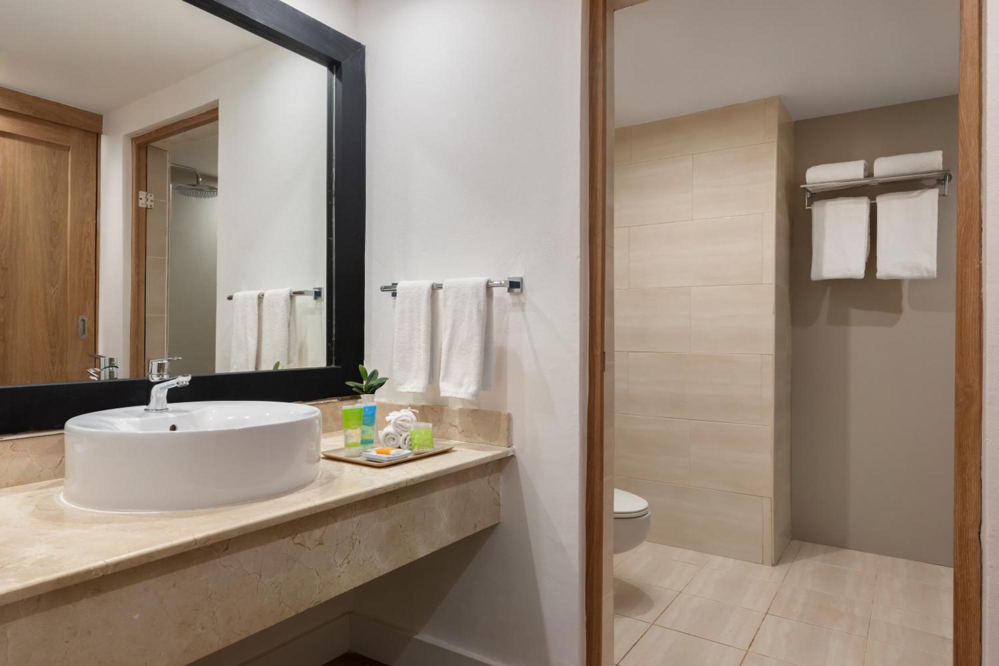 Deluxe Kamer met Kingsize Bed en Tropisch Uitzicht