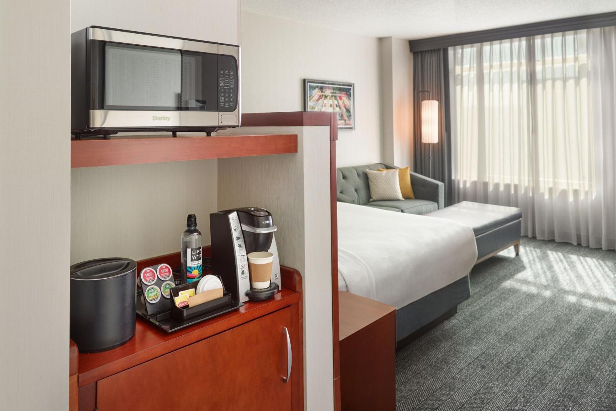 Kamer met Kingsize Bed en Uitzicht op de Stad
