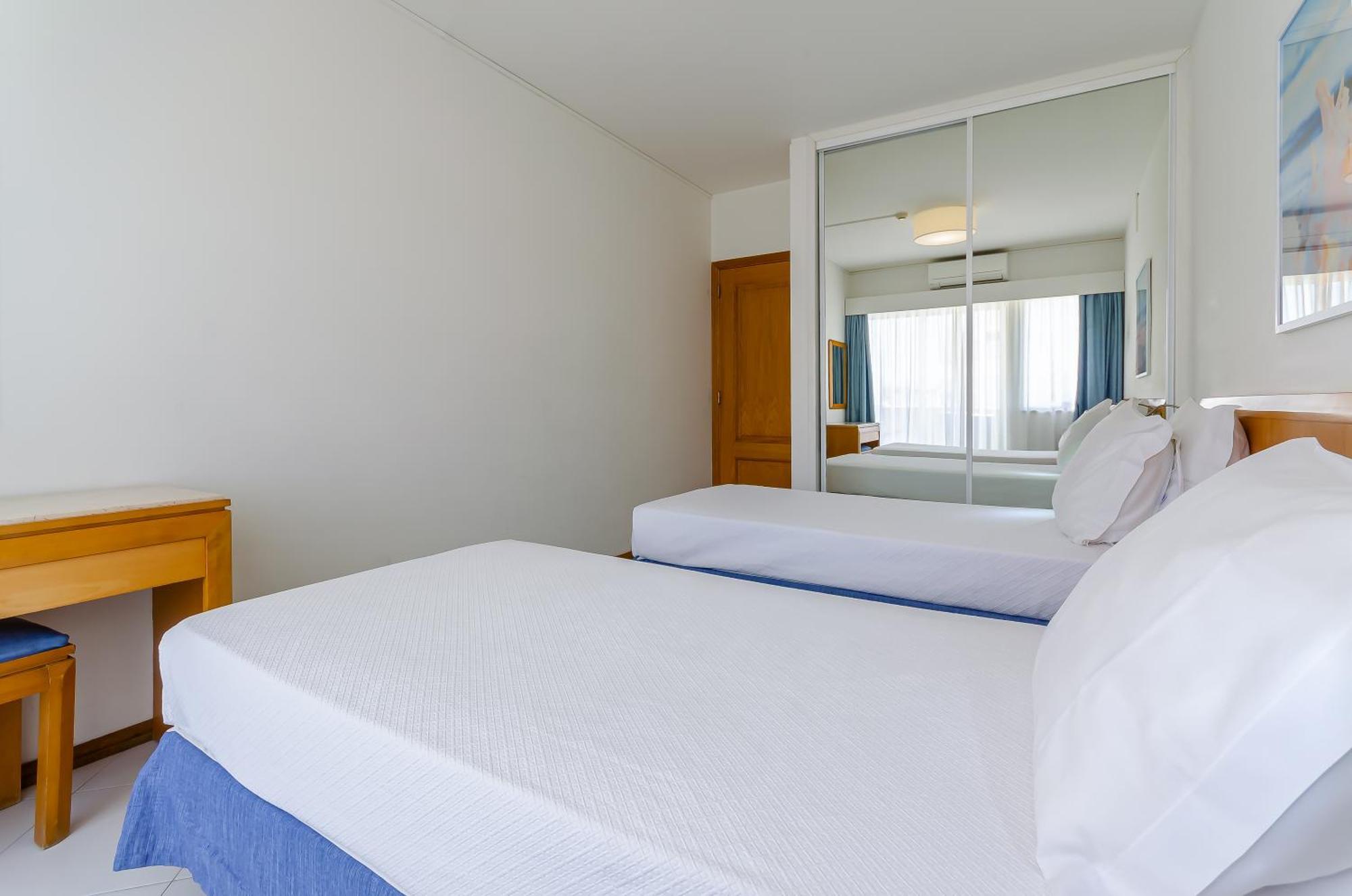 One-Bedroom Apartment with Side Sea View