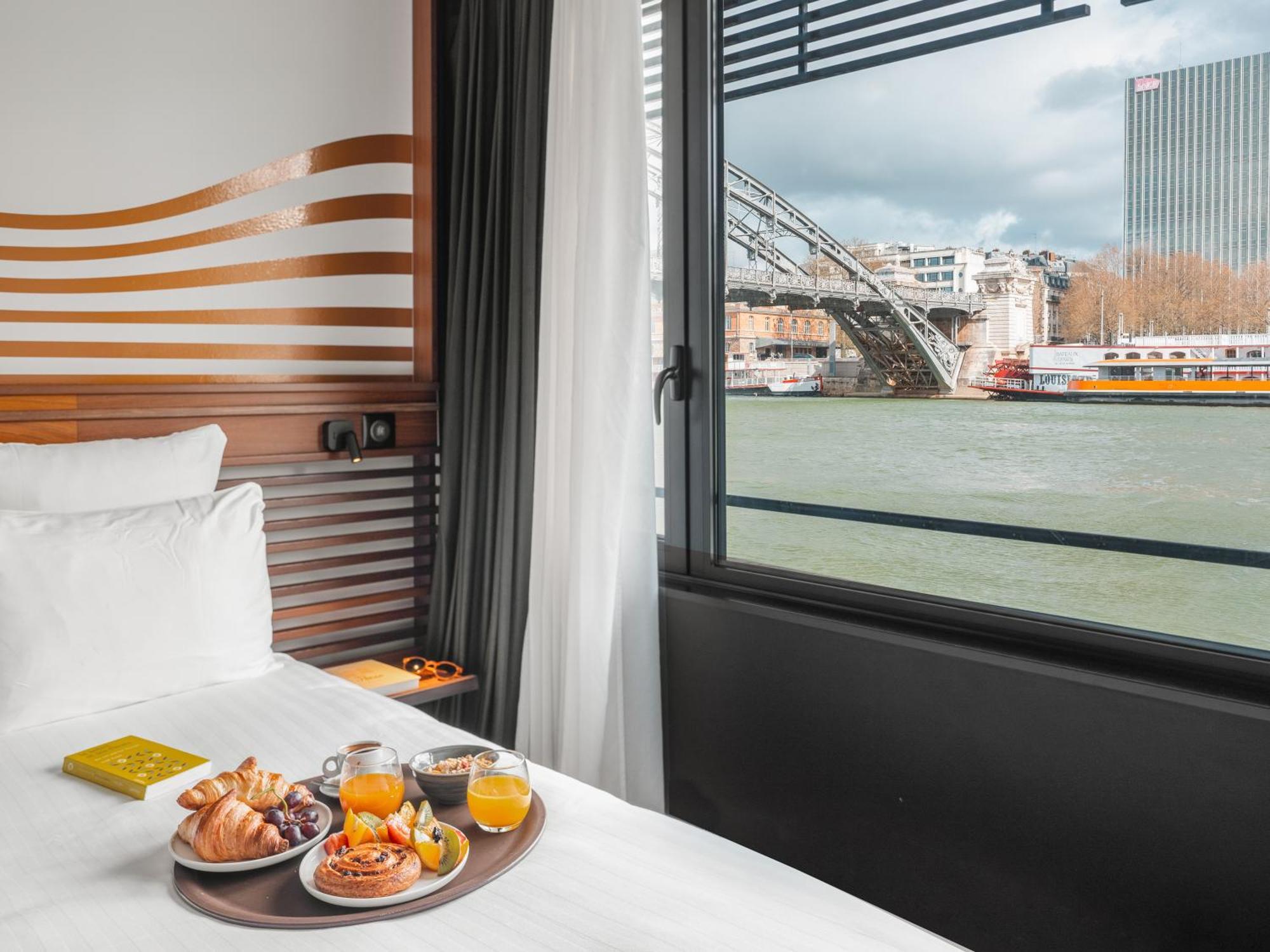 Tweepersoonskamer met Uitzicht op de Rivier de Seine
