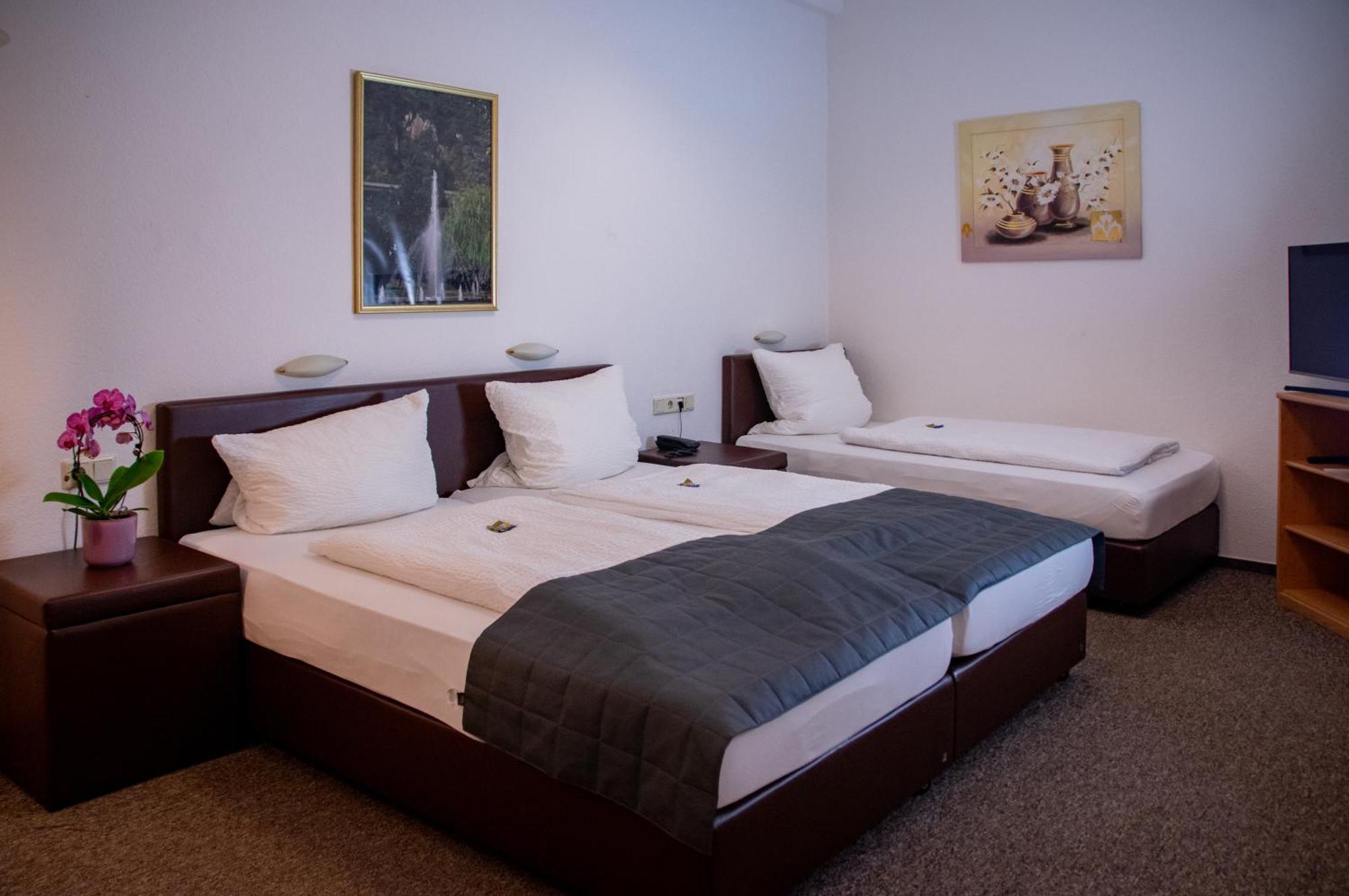 Dreibettzimmer