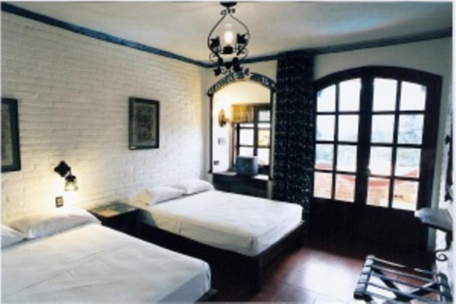 Chambre Double avec Deux Lits Doubles (1-4 Adultes)
