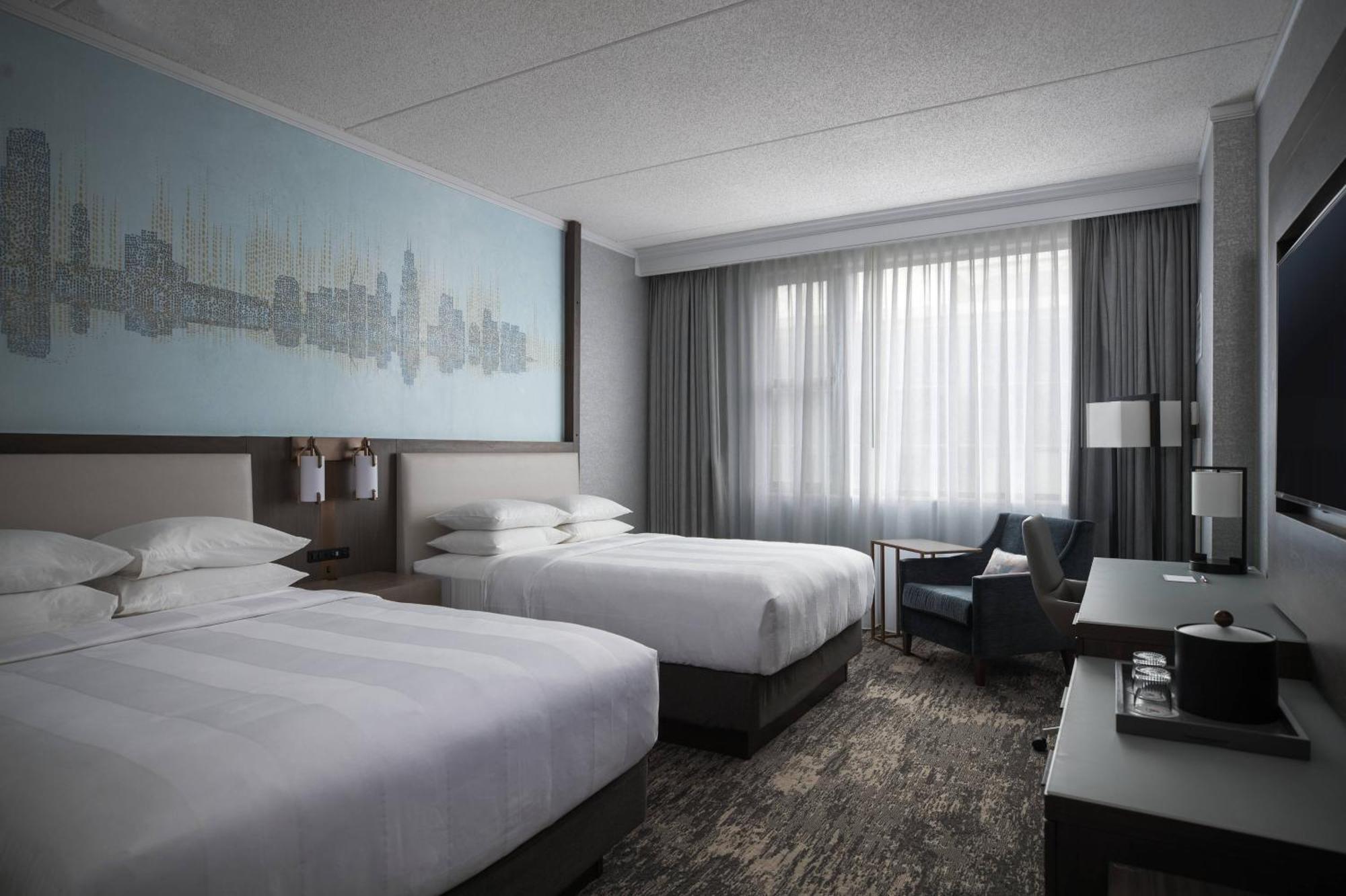 Deluxe Room with One King and One Queen Bed,1706128764:JPEG