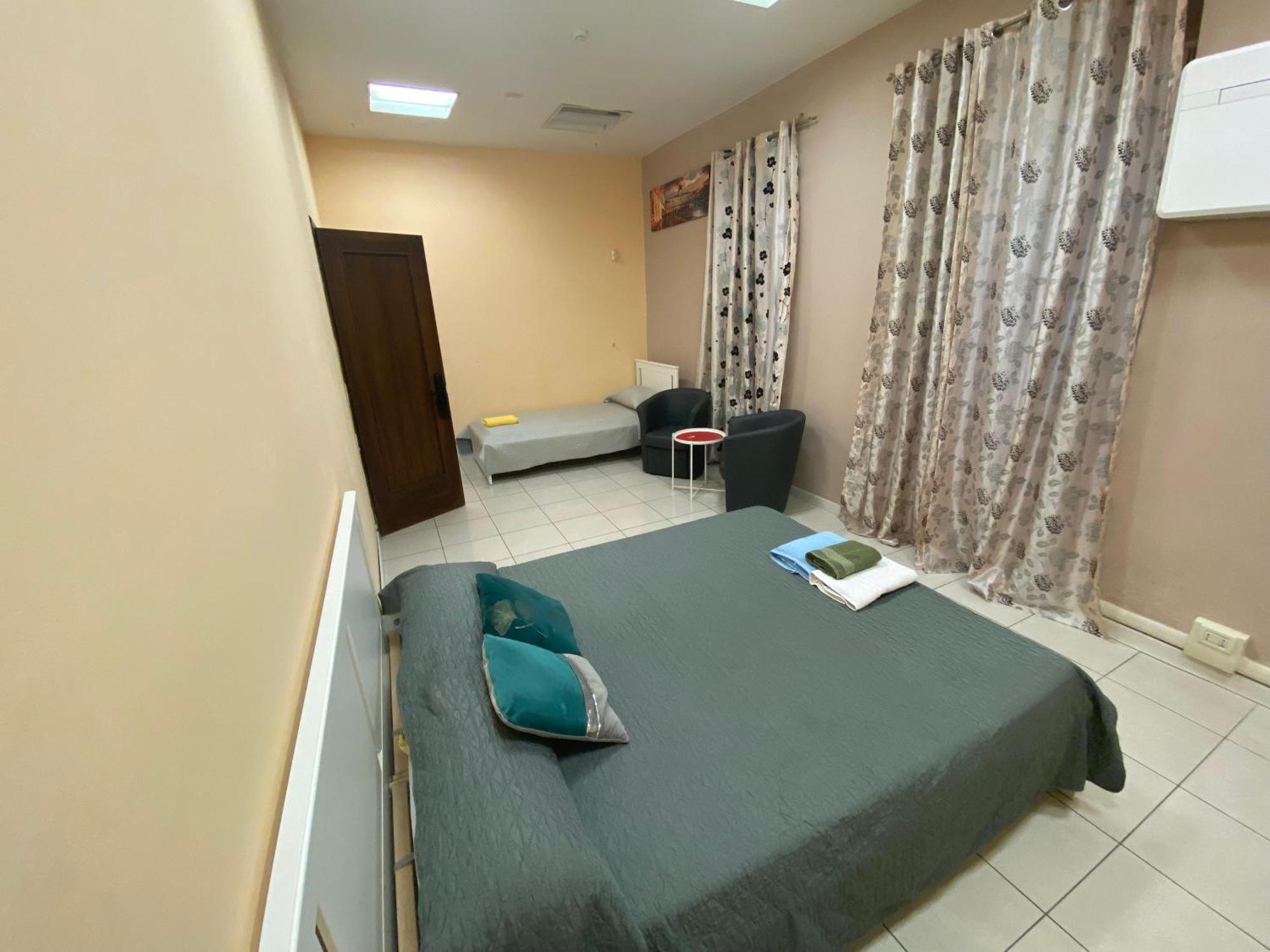 Habitación Triple con baño privado externo