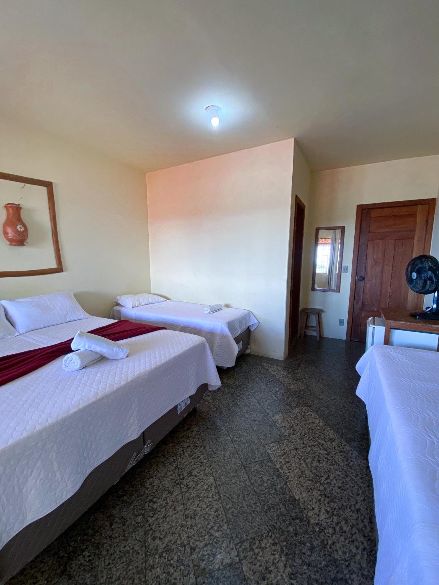 Quarto Quádruplo com Varanda