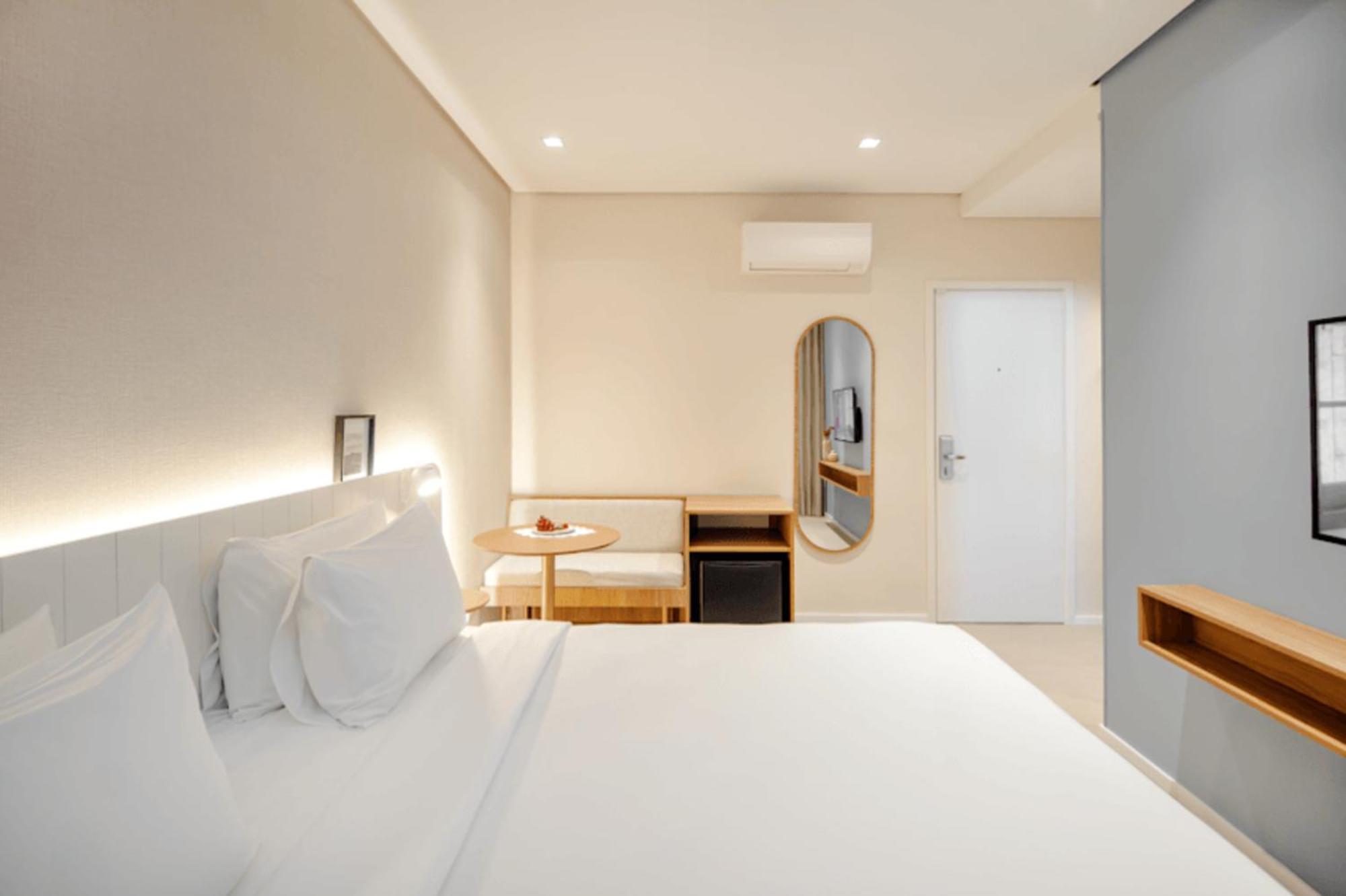 Quarto duplo premium com cama queen-size