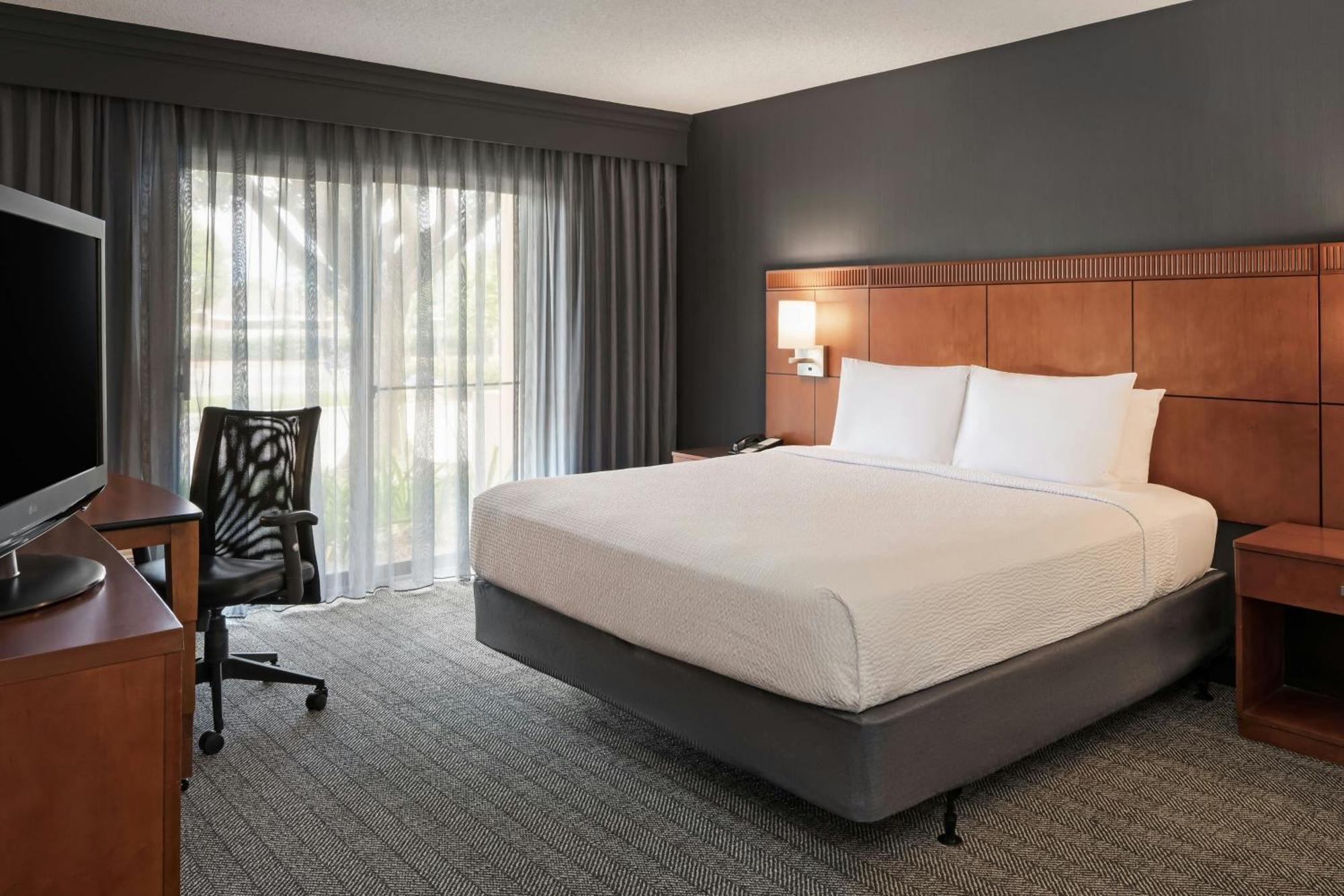 King Room with Sofa Bed and Roll-in Shower - Mobility and Hearing Accessible