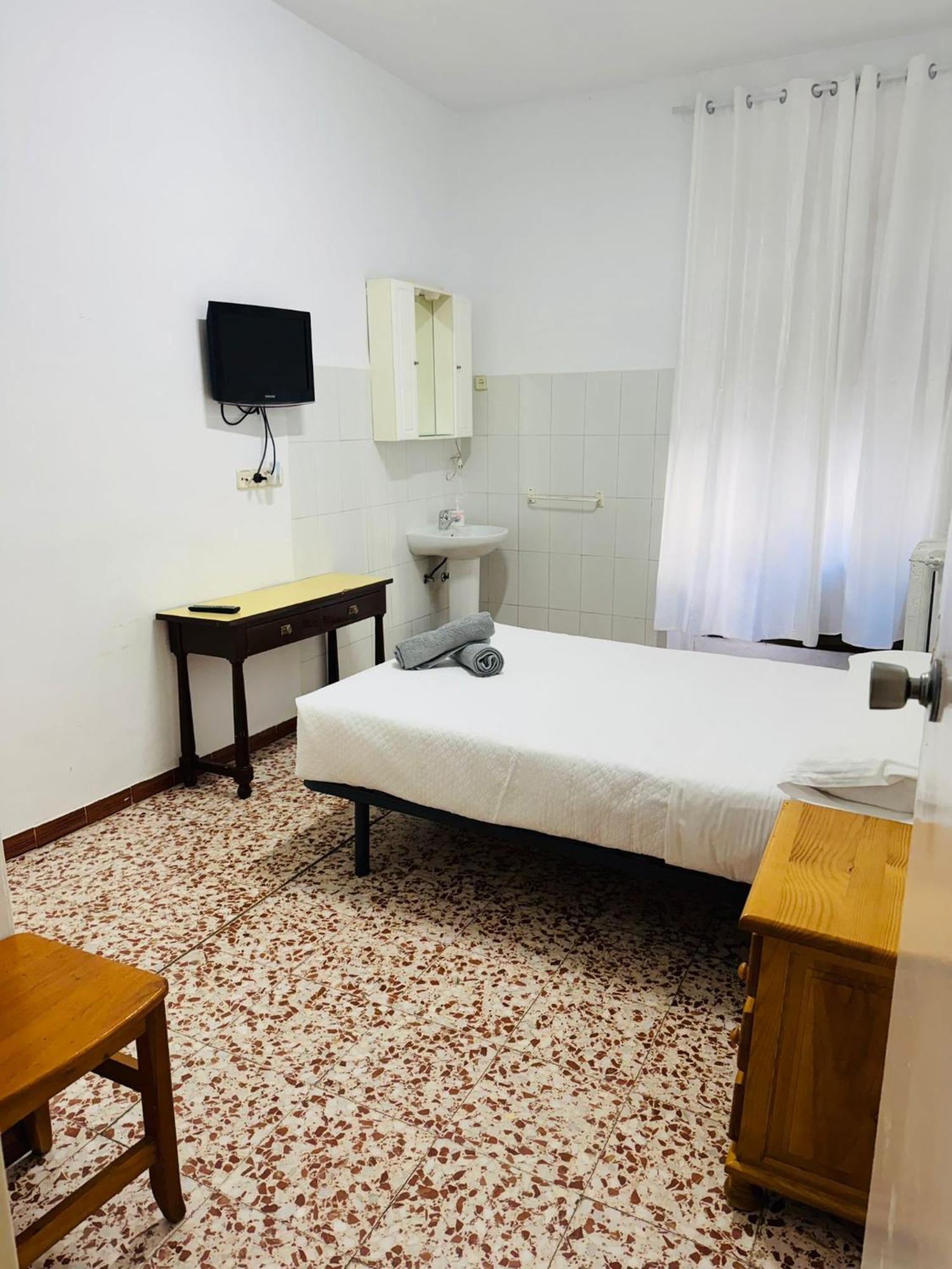 Quarto Duplo ou Twin com Casa de Banho Partilhada