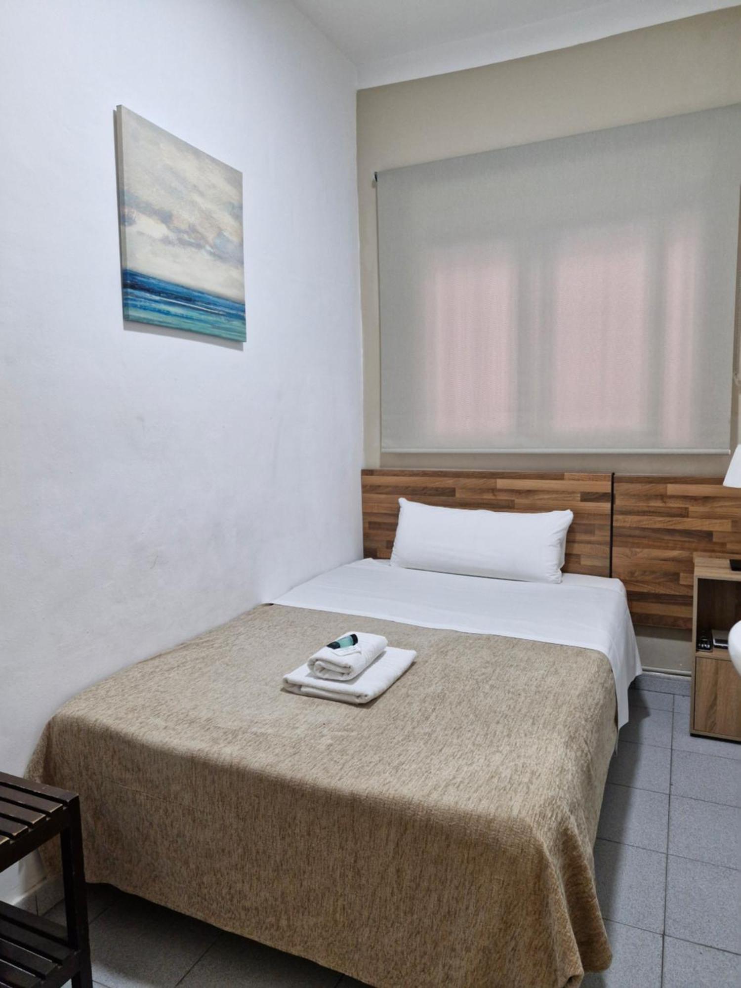 Camera Singola con Bagno in Comune