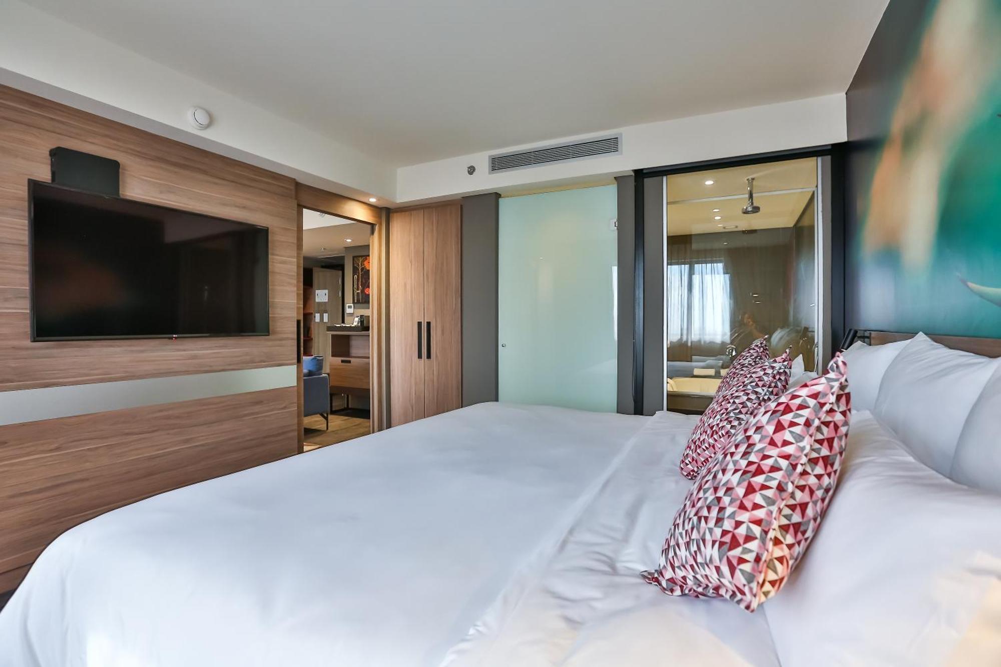 Suíte Superior com 1 Cama King-Size e 1 Sofá