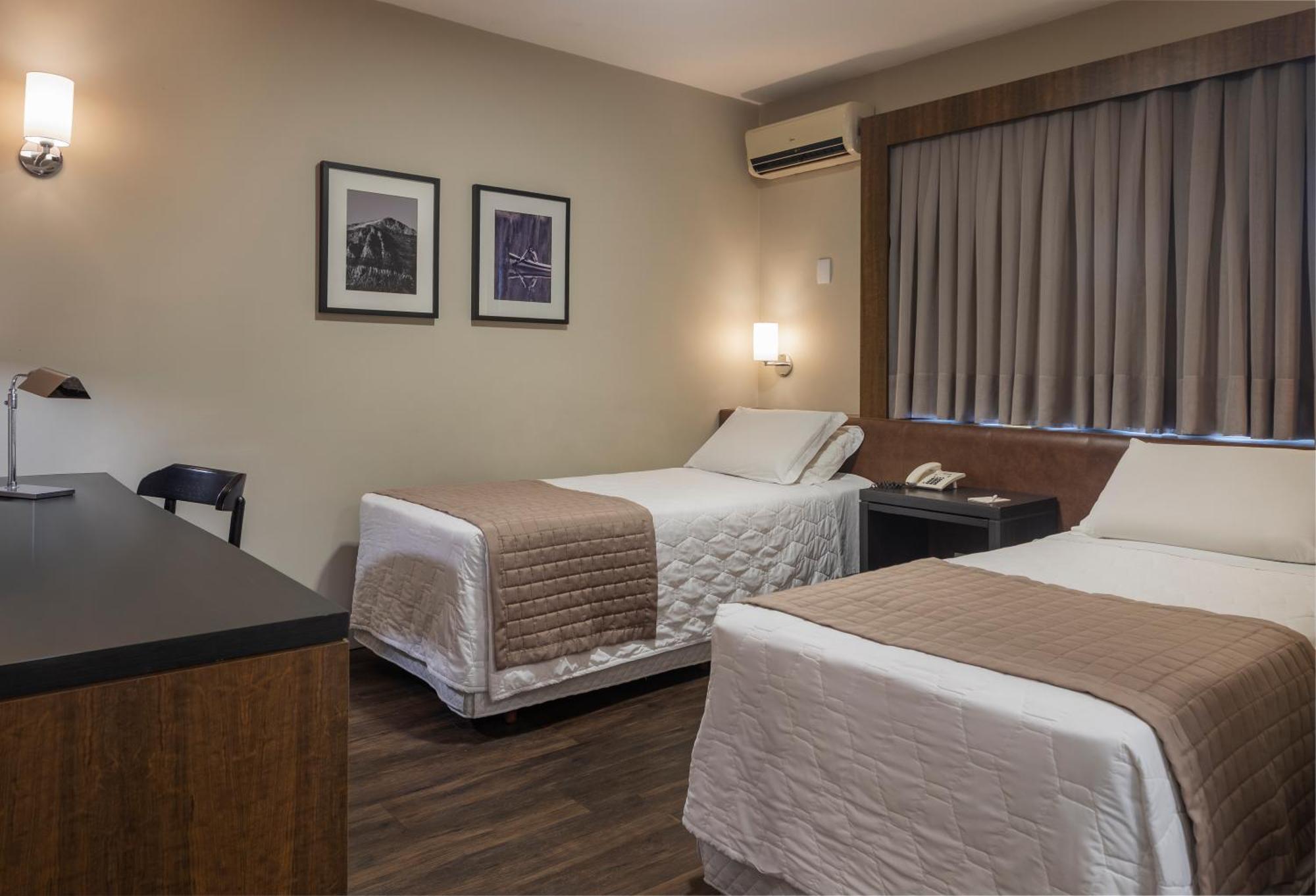 Quarto Executivo com 2 Camas de Solteiro