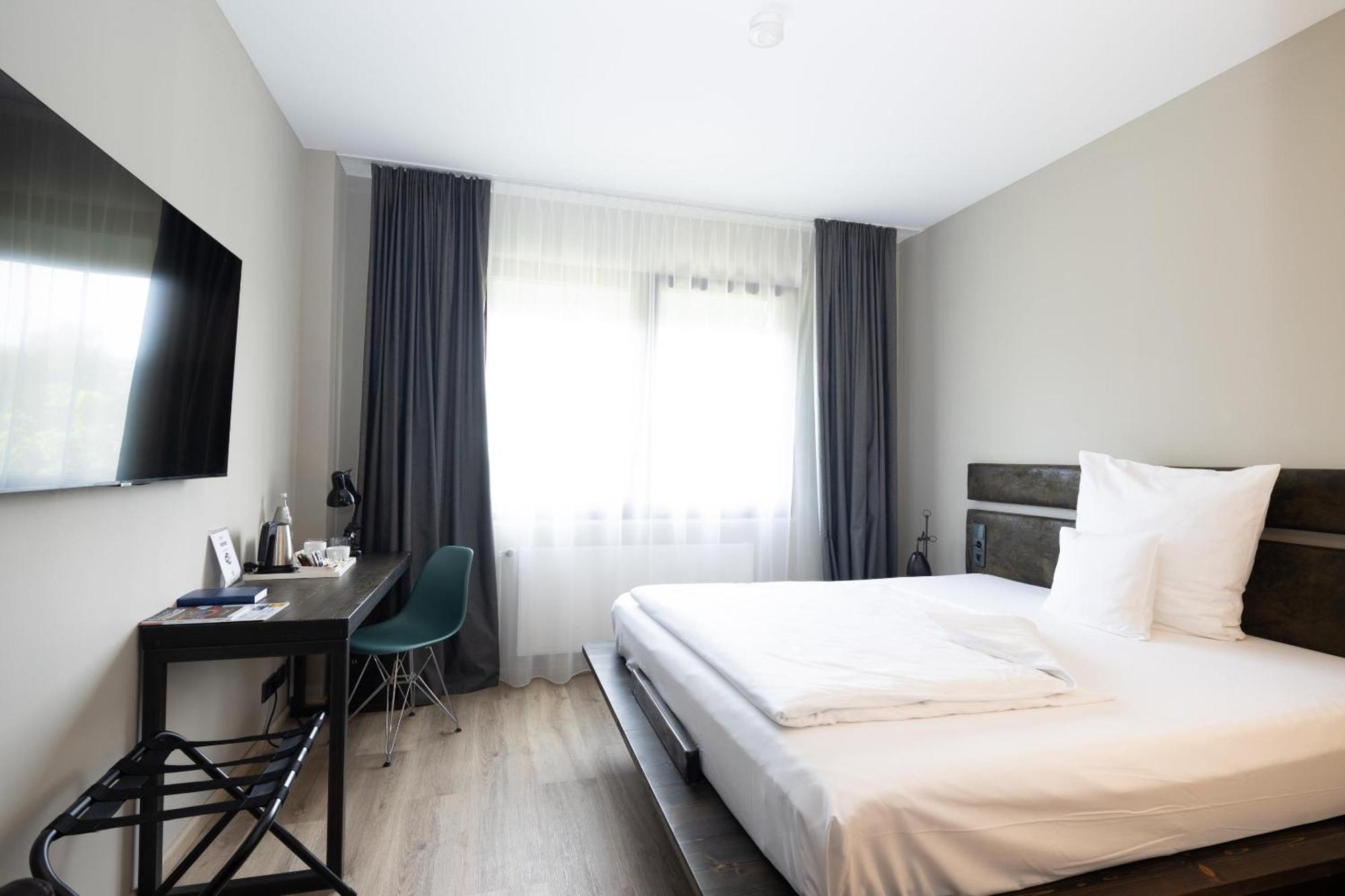 Comfort Designer Zimmer mit Queensize-Bett