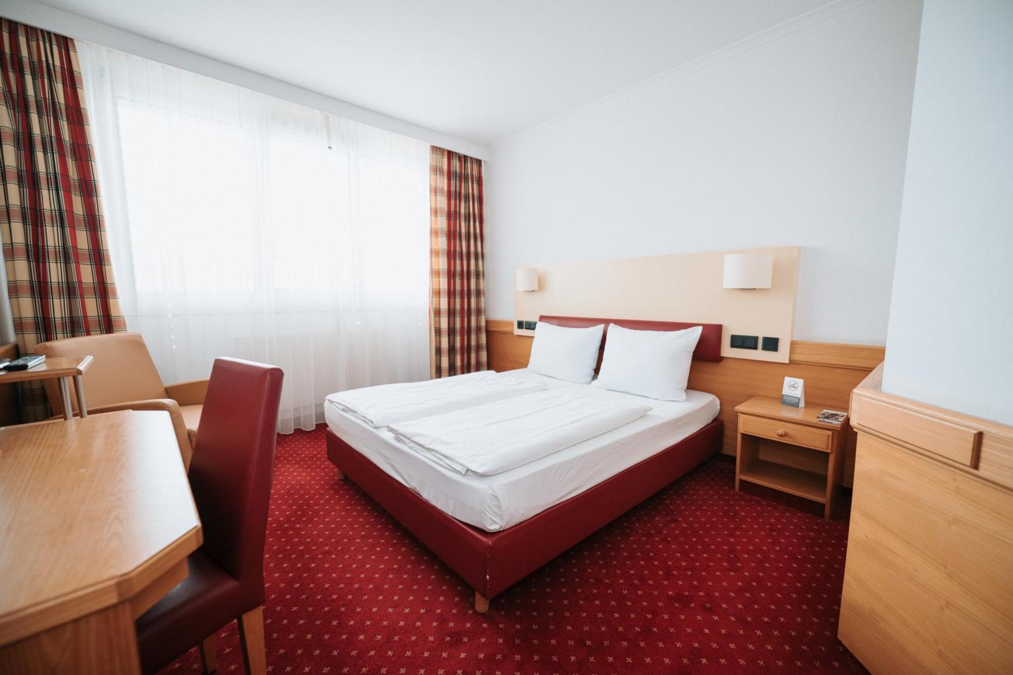 Zimmer mit Queensize-Bett