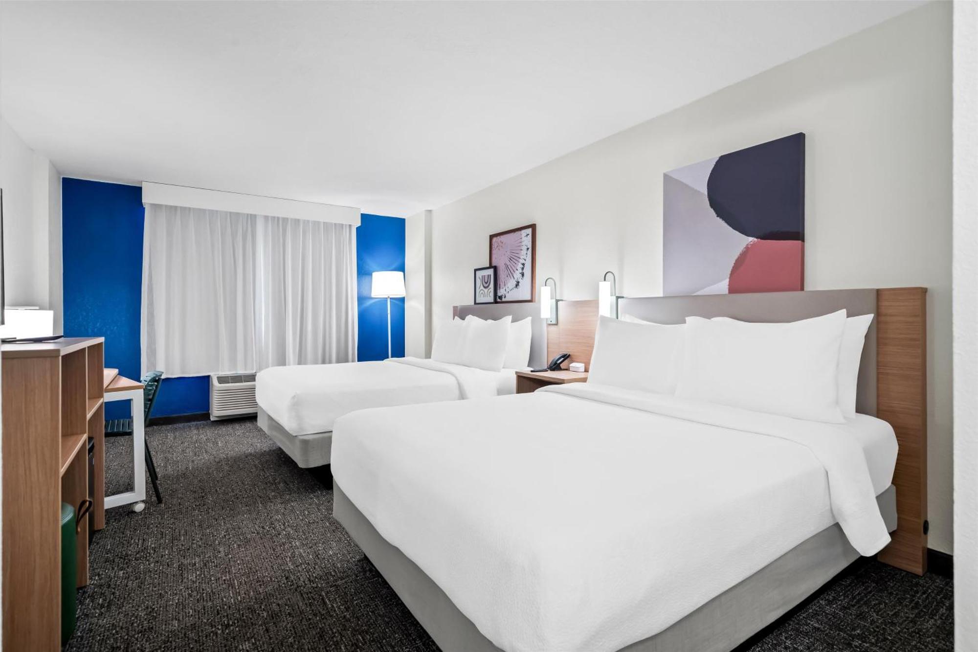 Kamer met 2 Queensize Bedden