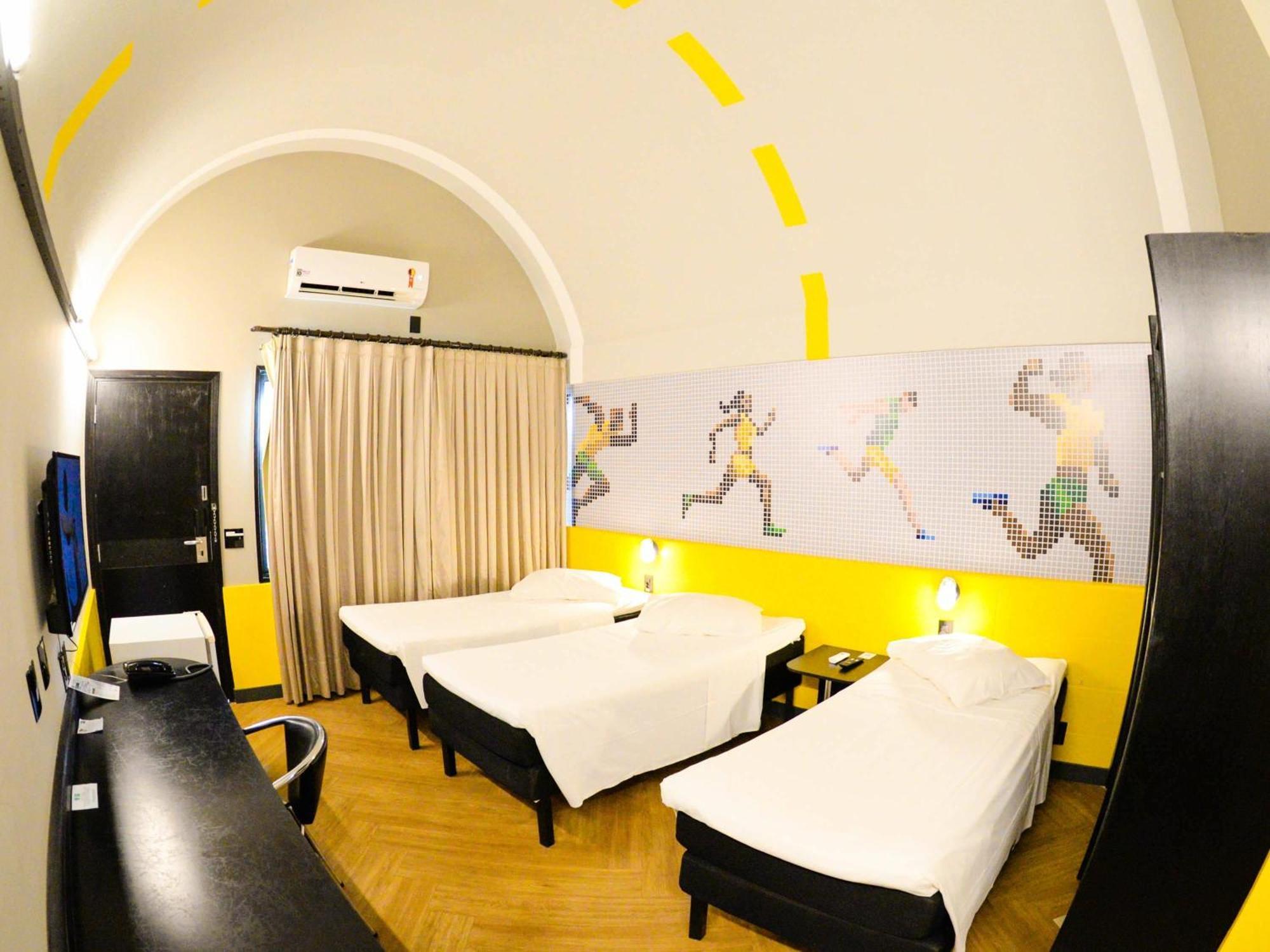 Quarto Triplo Executivo
