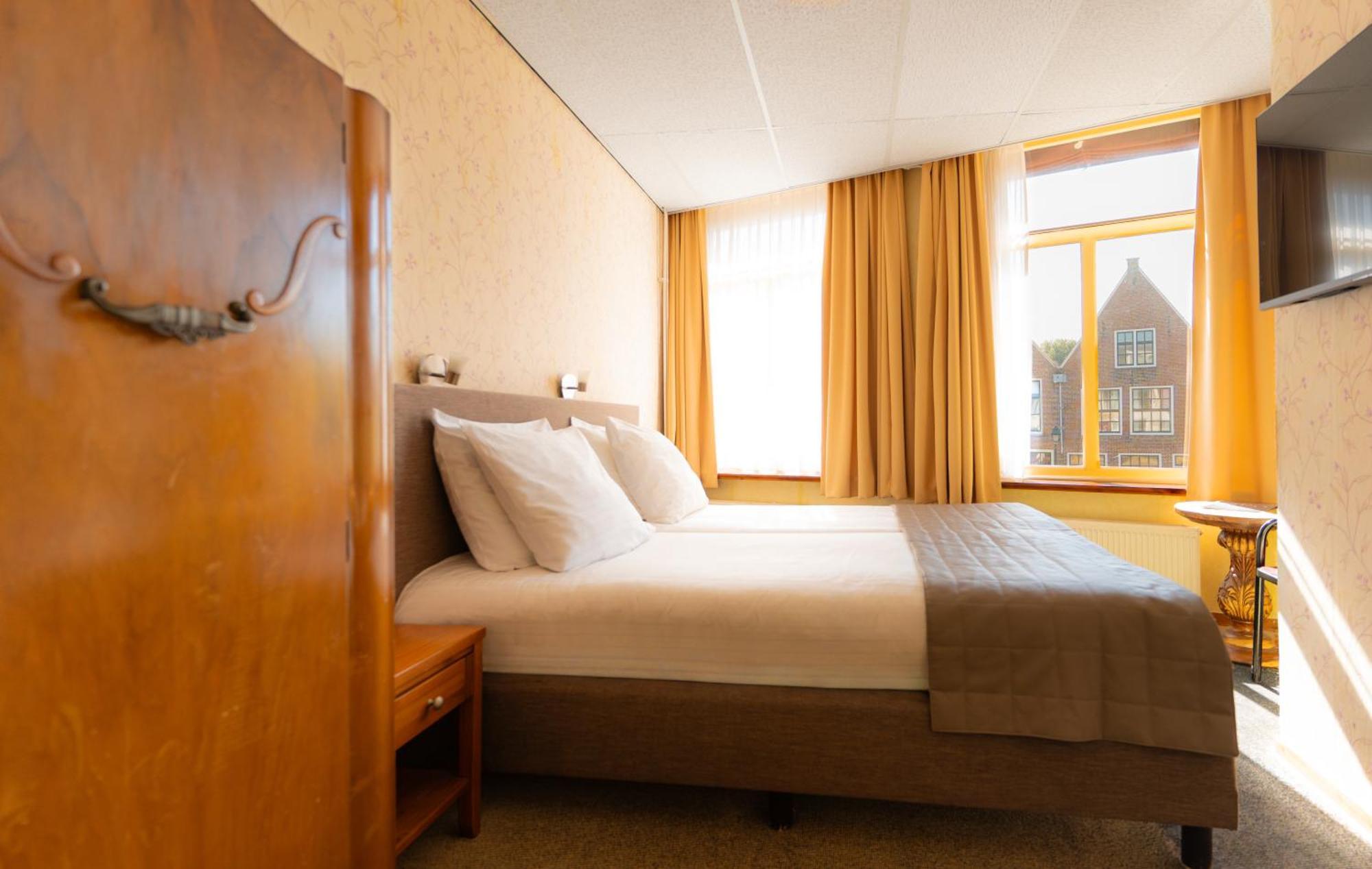 Budget kamer met een externe badkamer