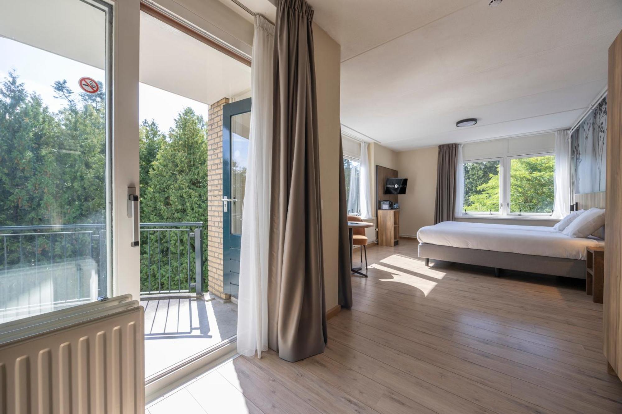Luxe tweepersoonskamer met balkon
