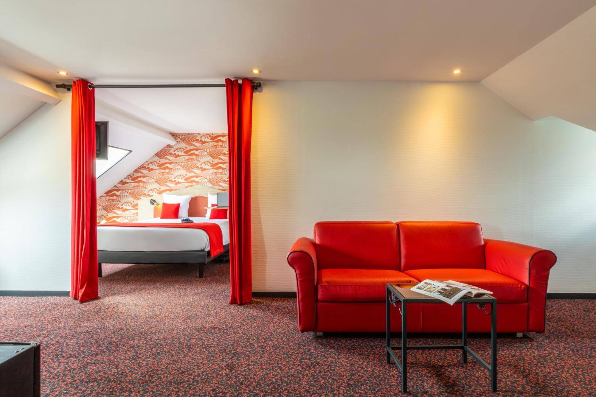 Suite with One Queen Bed and One Sofa Bed