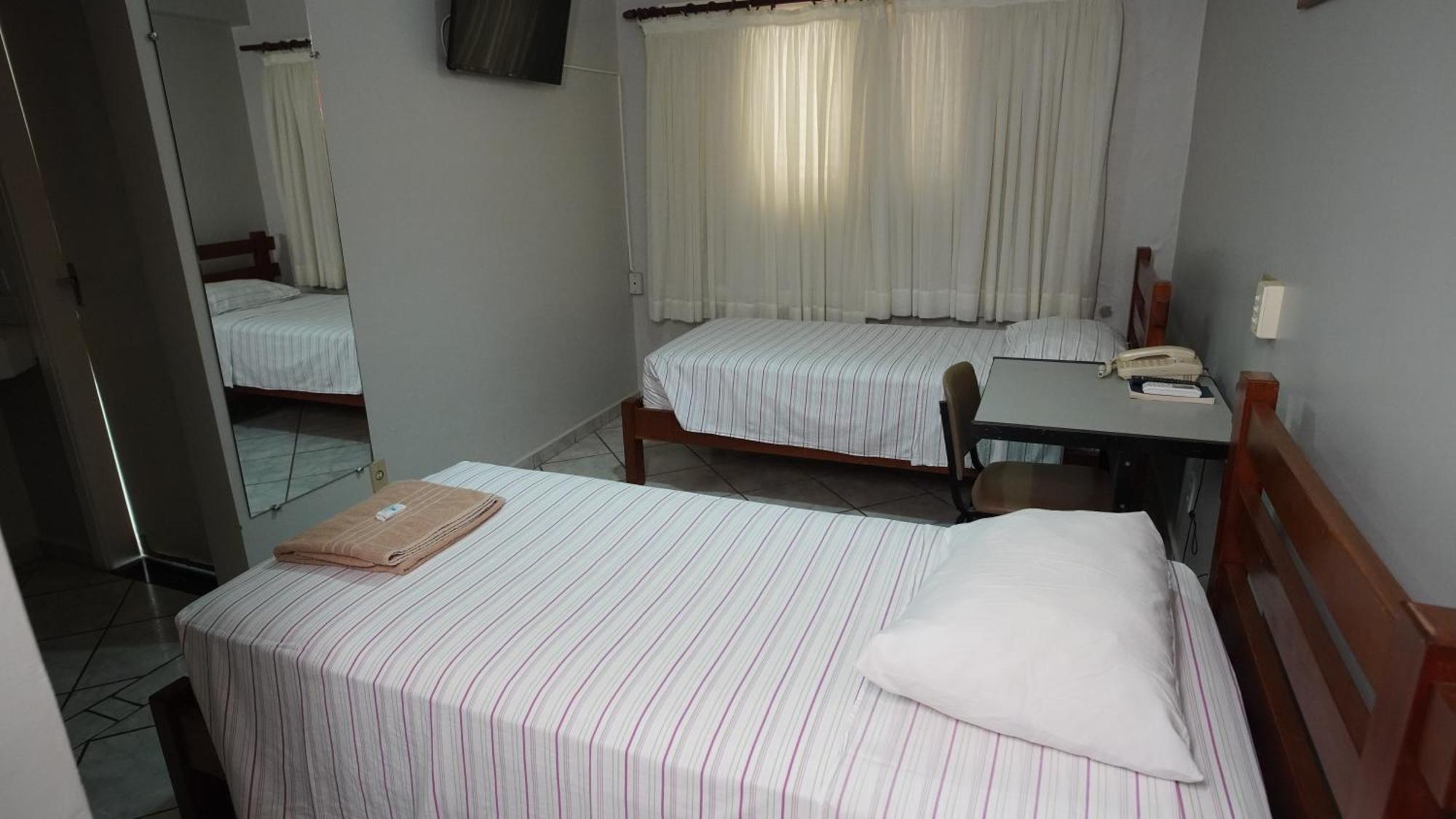 Quarto Duplo