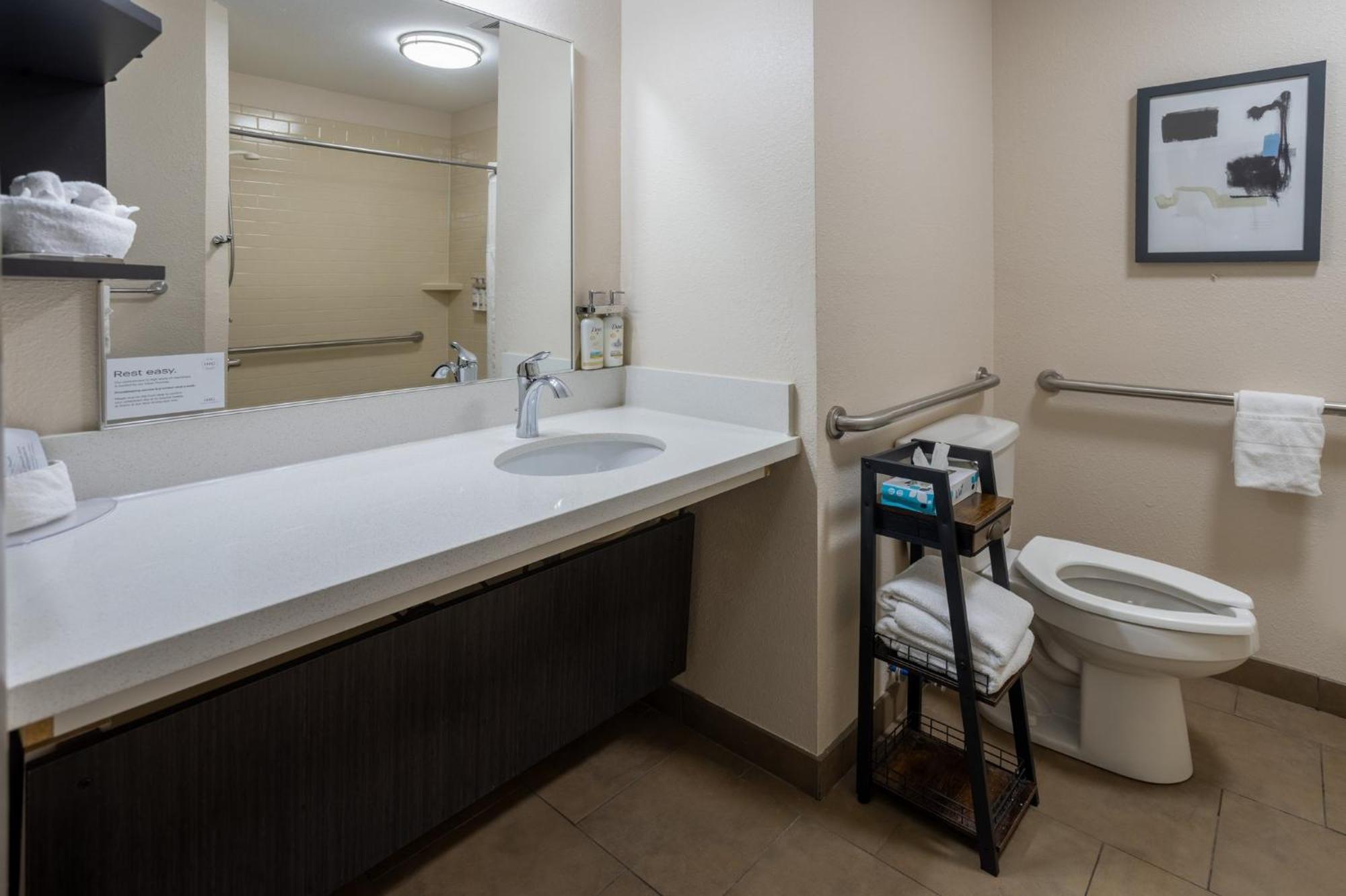 Queen Studio Suite with Roll In Shower - Mobility Accessible