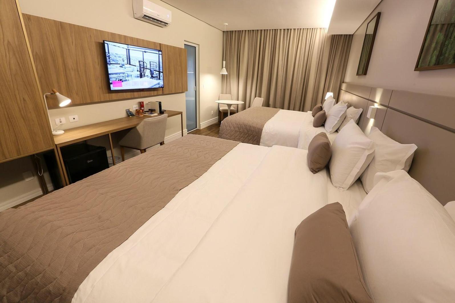 Quarto King com 2 Camas King-size