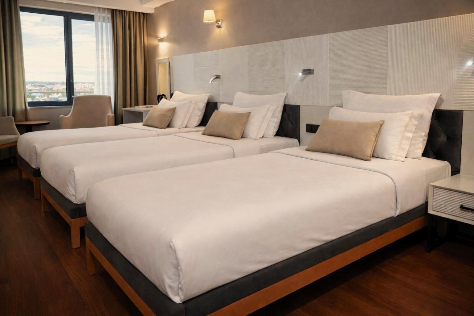 Standard Dreibettzimmer mit Stadtblick - Nichtraucher