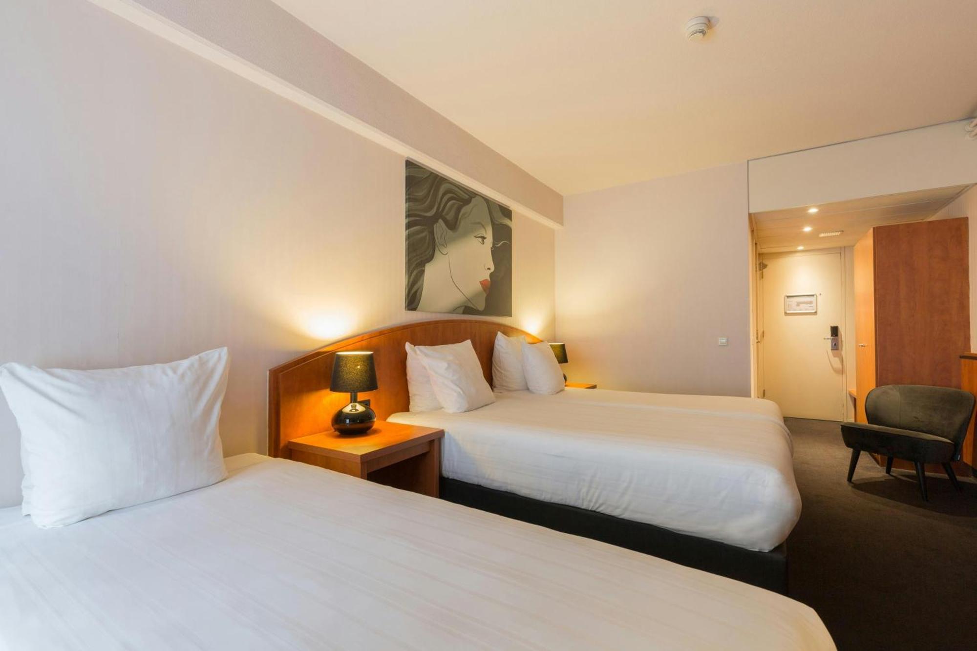 Comfort Kamer met 2 aparte bedden en 1 eenpersoonsbed