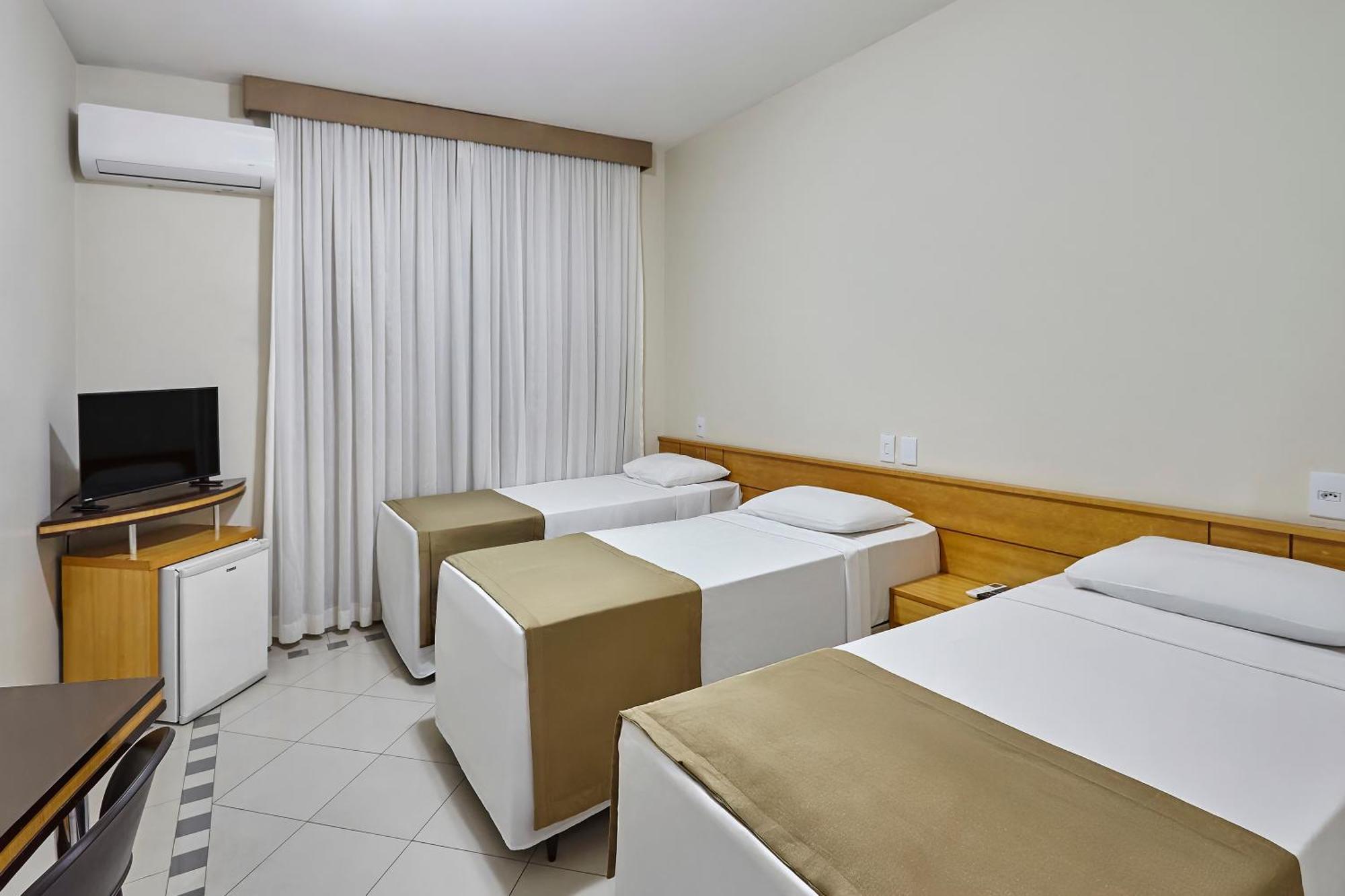 Quarto Triplo Executivo