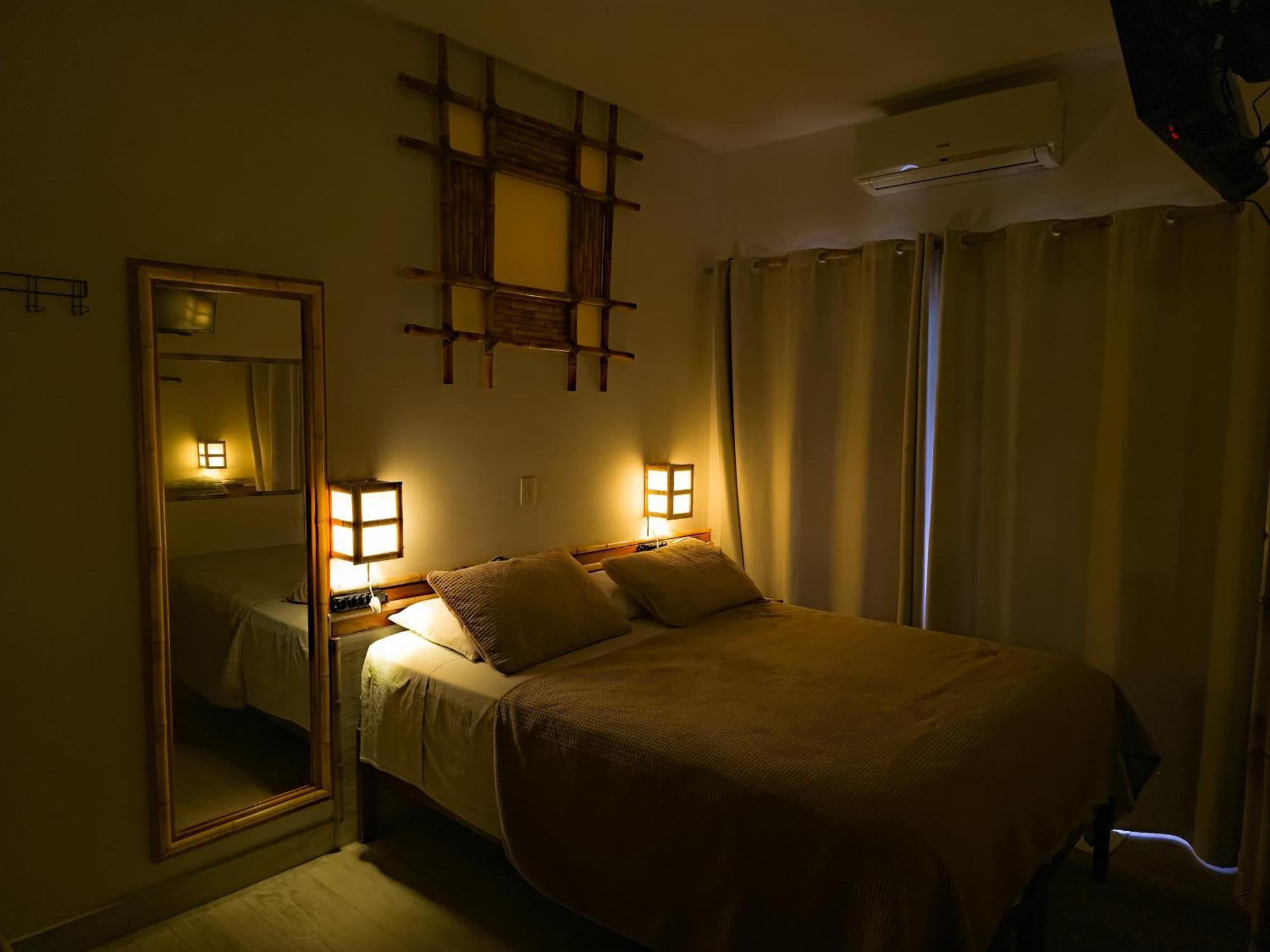 Quarto Triplo com Banheira