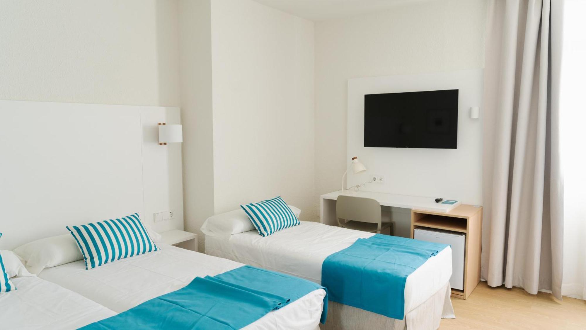 Habitación Cuádruple (2 adultos + 2 niños)