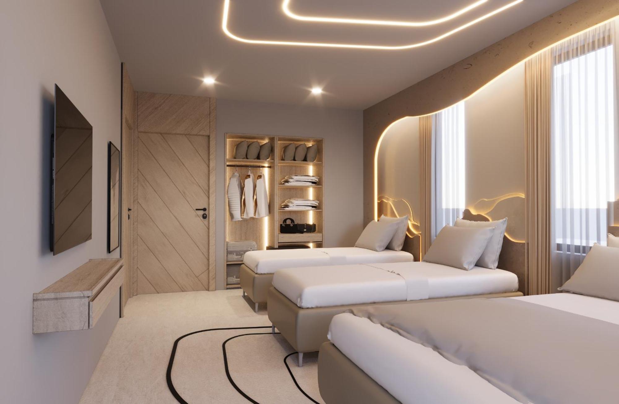 Dreibettzimmer mit Stadtblick