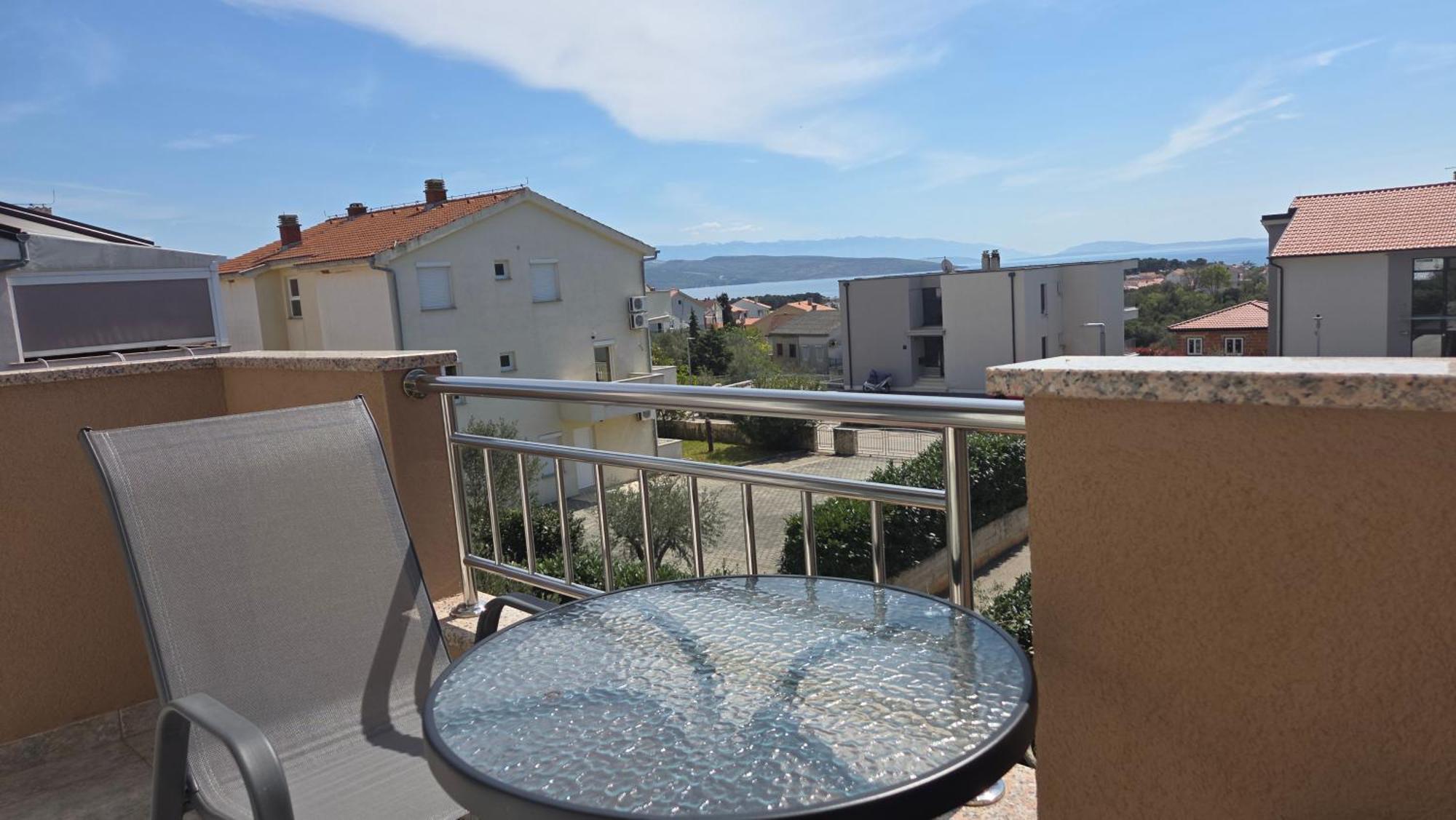 Doppelzimmer mit Balkon und Meerblick