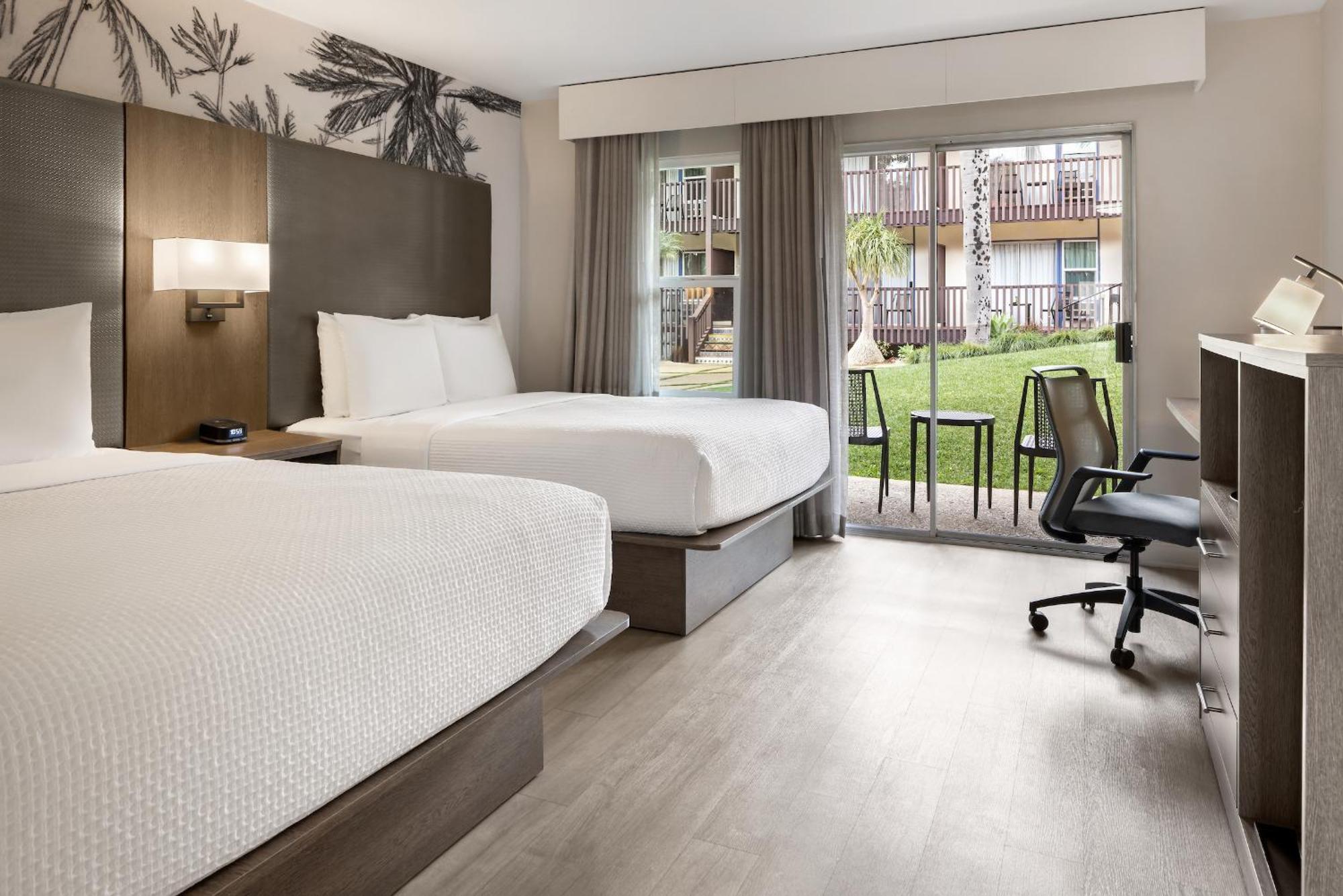 Standard Double Room with Two Double Beds and Courtyard View