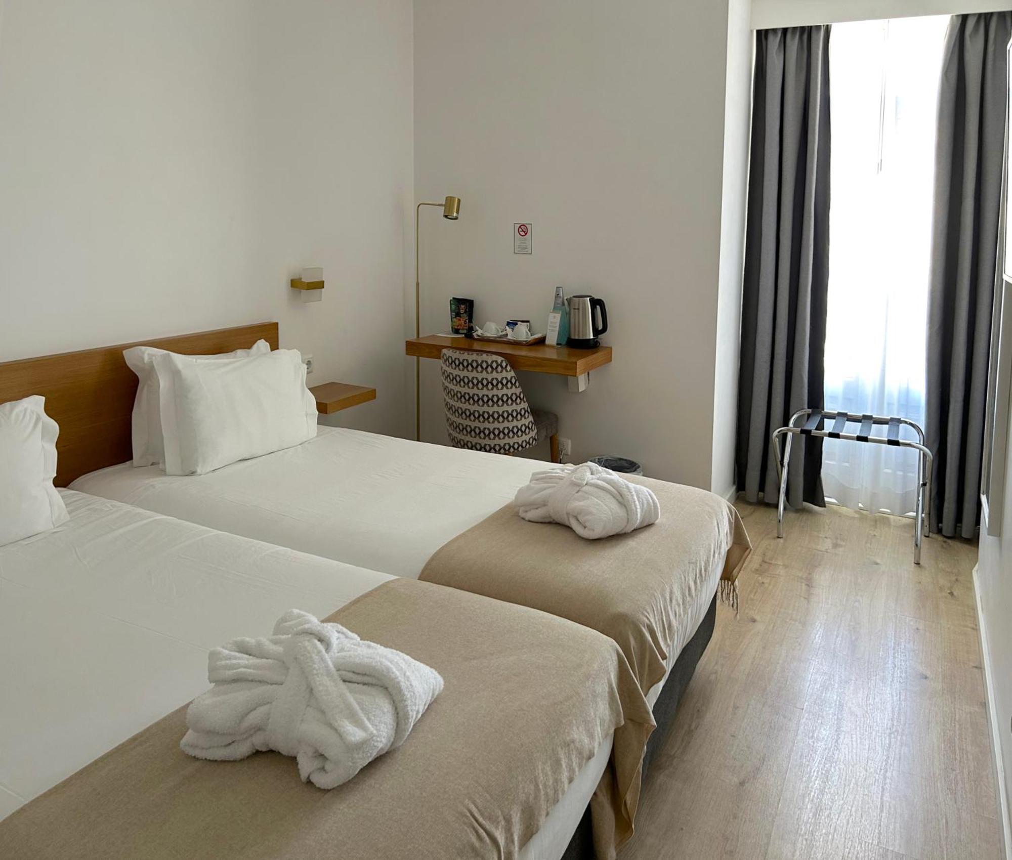 Quarto Twin com Vista da Cidade