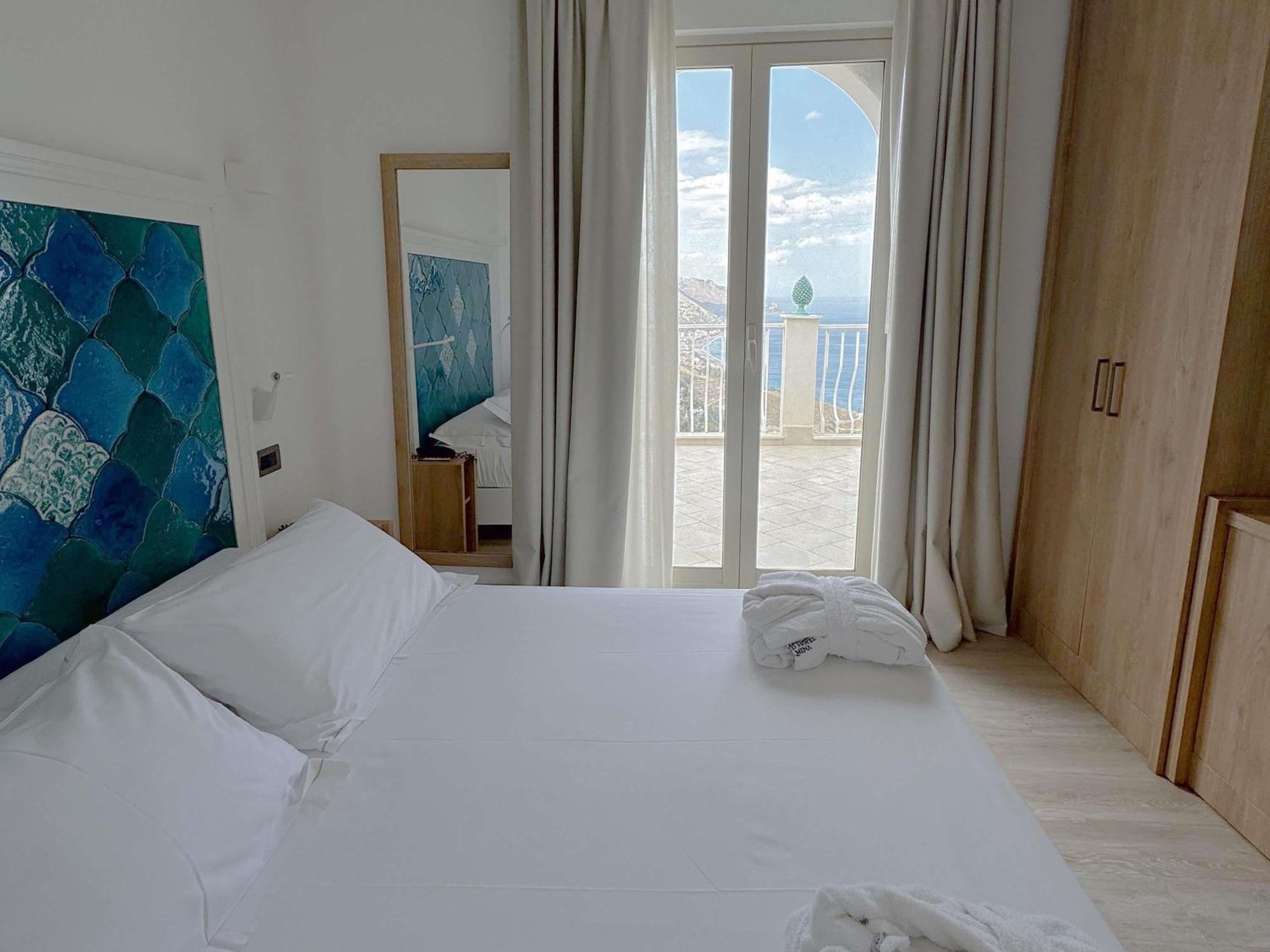 Deluxe Kamer met Queensize Bed en Slaapbank