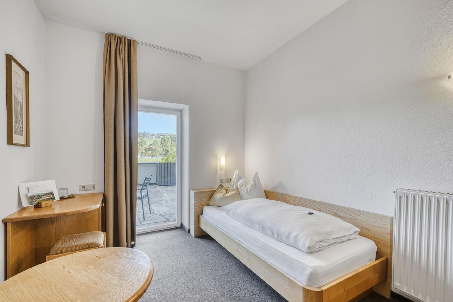 Einzelzimmer mit Balkon