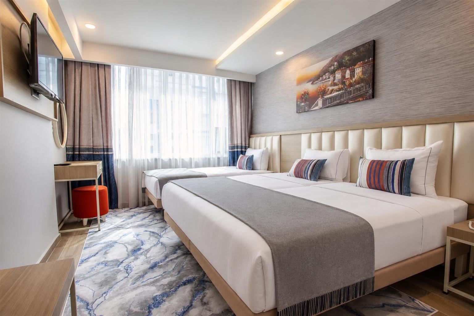 Deluxe Dreibettzimmer