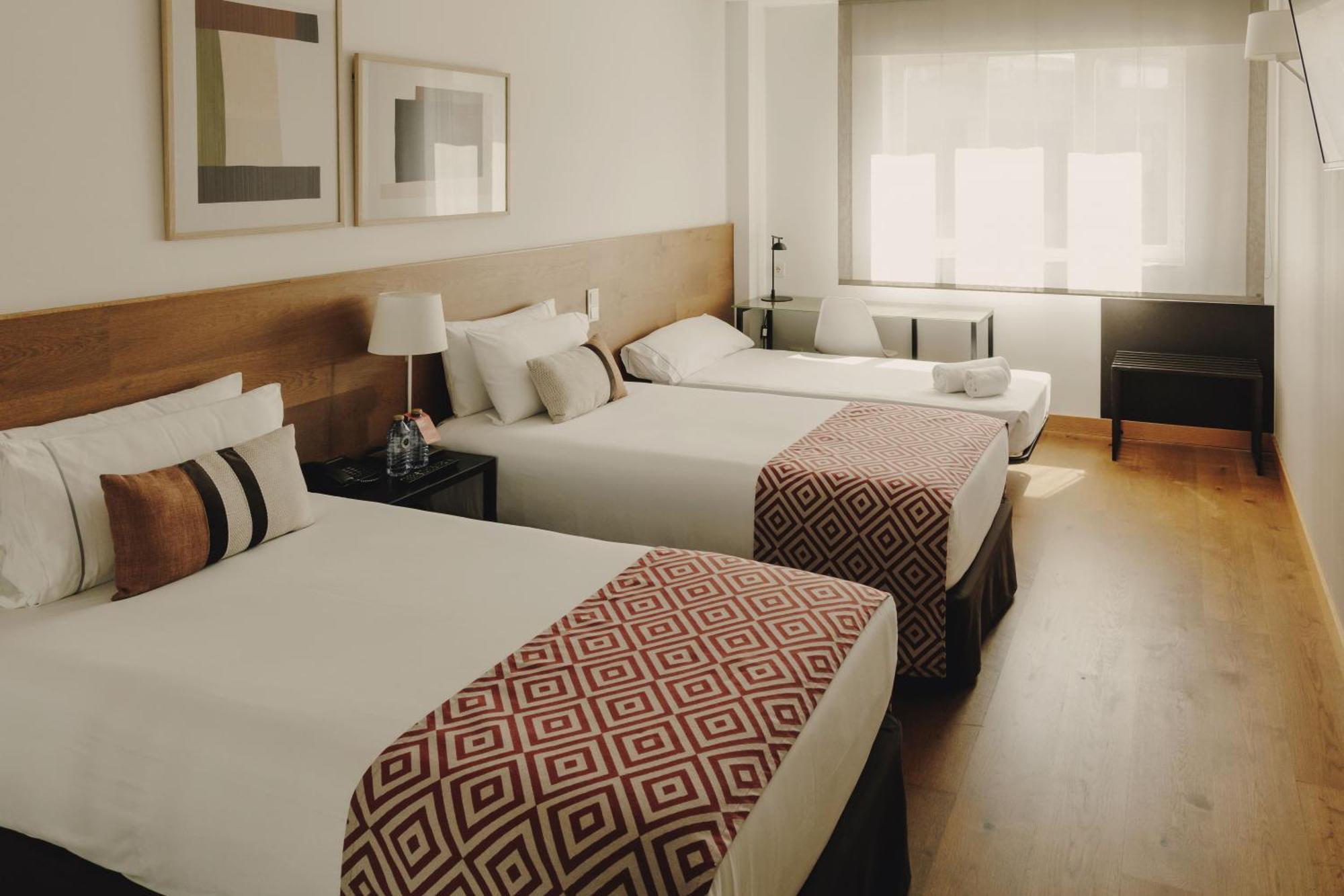 Tweepersoonskamer met 1 of 2 Bedden en een Extra Bed